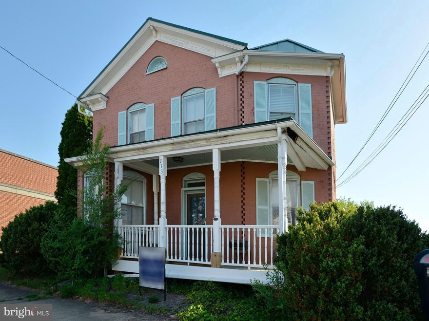 This property was formally an attorneys office with an apartment upstairs. I can be used as either a residence or as commercial. There is an access to back lot that has access through the alley that allows access to the second back yard that can be used for parking.  New standing seam metal roof was just on last year.