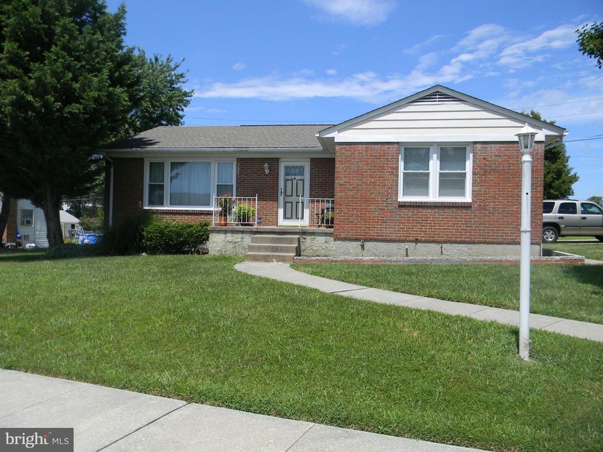 Charming ranch home on desirable corner lot. 3 bedroom, 1 bath rancher, updated kitchen with granite counters and gas range. Eat-in breakfast counter. Wood floors, replaced windows. Nice yard with shed. Partially finished lower level with gas fireplace. Potential 4th bedroom or office. 2 car parking pad. Home warranty included! Can join community pool. Close to I-695