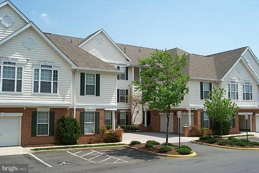 Wow!! Freshely painted 2 bedroom, 2 bath condo in sought after South Riding withLarge den with gas fireplace, attached garage, bay window, and luxury bath! 1322 square feet all on ground level, breakfast bar, foyer entry, gorgeous common ground next to lake and a short walk to shopping center for groceries and dining! Don't miss this opportunity!