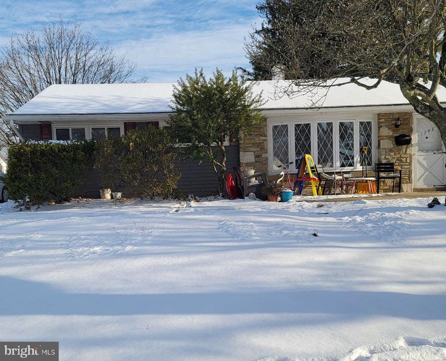 Welcome to this charming stone rancher in Abington Township, offering spacious one-level living just steps away from Roslyn Park. Enjoy the convenience of walking trails, a brand-new playground, sports fields, and a skate park right down the street. Step inside to find a bright living room with a large bay window, perfect for relaxing after a long day. The modern kitchen features stainless steel appliances, granite countertops, and ample wood cabinetry, seamlessly connected to a cozy dining area. Down the hall, you’ll discover a master bedroom, two additional  bedrooms with closets, and a full hall bath with a soaking tub and linen closet.

The home also includes a pull-down attic for added storage and a separate utility and laundry room equipped with newer washer and dryer. The large family room boasts an updated three-piece bathroom with a walk-in shower, offering potential for a master or in-law suite. Cozy up in the formal living room by the stone fireplace while enjoying views of the expansive backyard. With three versatile spaces for relaxing, entertaining, gaming, or schoolwork, this well-maintained home truly has room for everyone. Bigger than it looks, this gem is sure to sell fast—don’t miss out!