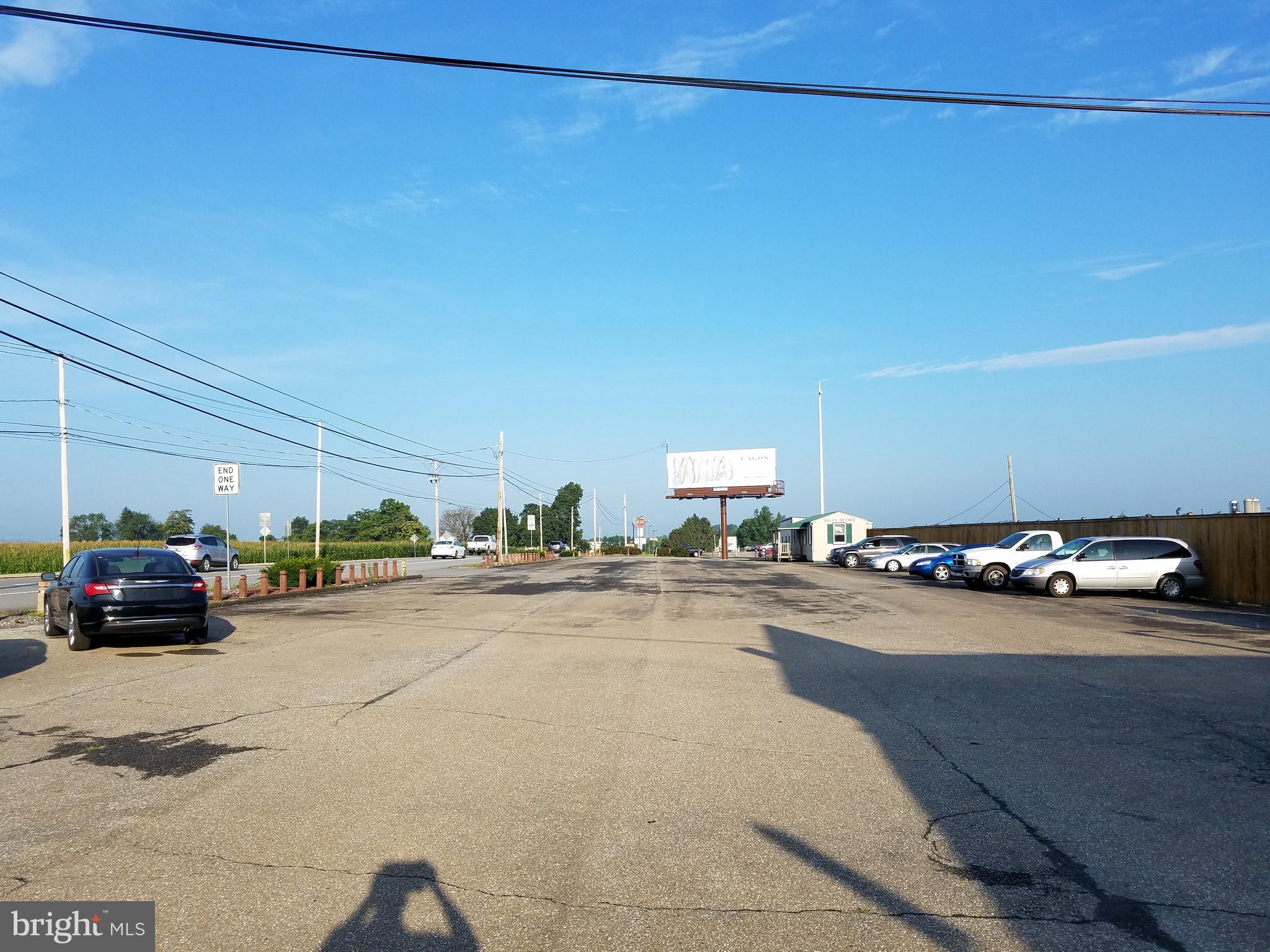 Lot #1, 2.38 acres, Lot #2; 1.29 acres Former auto dealership with 50x110x14' high shop, large garage doors, office space, 150+ spaced , paved parking lot, public sewer. (purchase lot#1 for $995,000 or 1&2); Lot #1 has 100+ paved parking spaces with 6295 sq ft building, Lot #2, 1.5 +/- acres with notary building, 7-income producing mobile home park, large billboard. Located close to Chester County/Lancaster County line, along Rt. 30, public sewer. Great business location with income. lot #1 tax ID 5604804000000 lot #2 tax ID 5609456100000