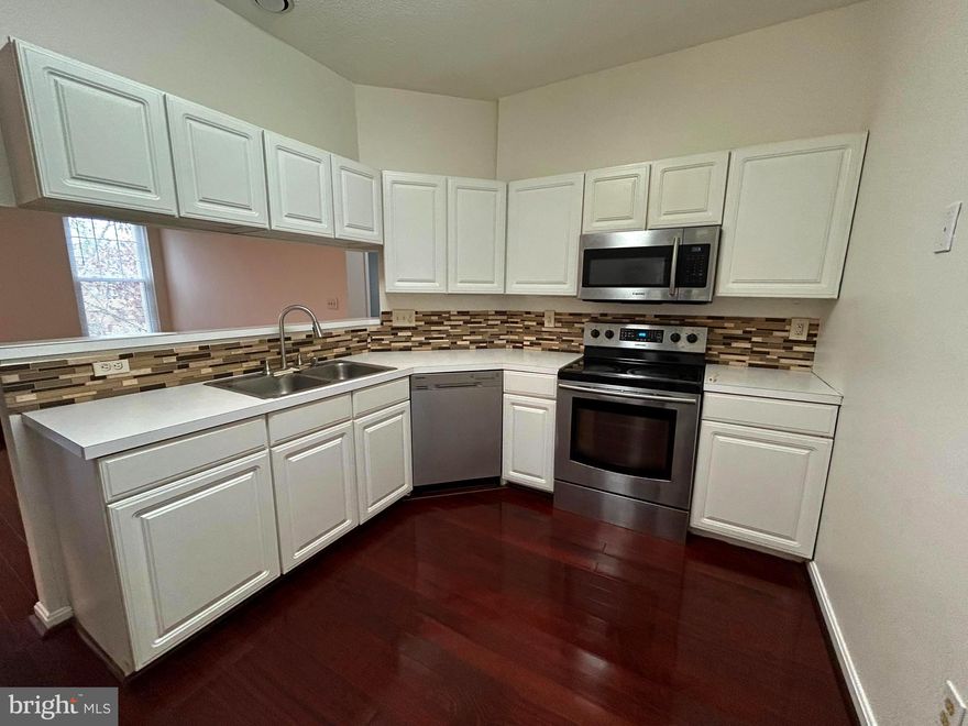 Welcome to 7204 Bogley Rd #303, a spacious top-floor condo set at the rear of the building for maximum privacy and tree-lined views and complete with coveted garage parking included in the rent.

This bright and inviting 3-bedroom, 2-bath residence offers generous square footage and excellent closet space throughout. Large windows fill the home with natural light, showcasing serene views of the surrounding greenery. The open-concept living room, dining area, and kitchen create a comfortable flow ideal for everyday living and entertaining. The thoughtfully designed layout provides true separation of space: the primary bedroom with en suite bath is located on one side of the home, while the two additional bedrooms and second full bath sit on the opposite side, perfect for privacy, guests, or a home office. Step out onto the private balcony to relax among the trees, with the added convenience of extra storage in the balcony closet.

Tenant pays for all utilities outside of parking.