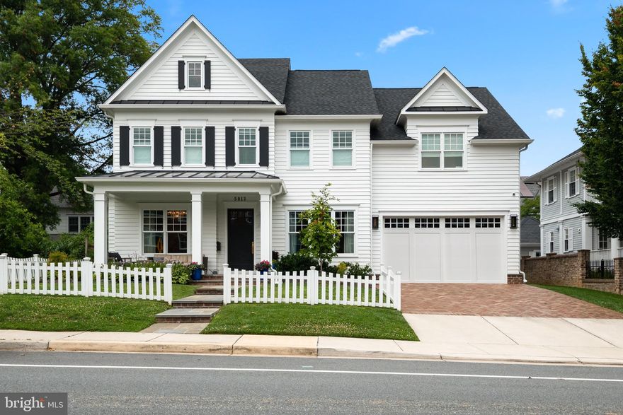 Welcome to 5013 Elm Street, an expertly renovated and custom designed 6 Bedroom, 6 Full Bath, and 2 Half Bath home in Edgemoor. The present owners purchased this home new in 2017 and meticulously added to and updated the entire property with Kandel Construction to the highest standards. Reconfiguring the floorplan and adding additional space make this 4 level and 5,900 SF home the perfect sanctuary for the most discerning purchaser. Edgemoor is Bethesda’s premier neighborhood with a sensational location in the heart of Downtown Bethesda. Immerse yourself in the convenience of being within walking distance to popular boutiques, cafes, restaurants, and amenities – all while enjoying the comforts of an expansive custom-built home with an incredible outdoor oasis. The superb Backyard is surrounded by lush landscaping and is centered around the heated Alpine Salt Water Pool that boasts a relaxing waterfall, a tiled Patio/Sun Deck, and an outdoor accessible Powder Room. The best of all worlds is here at 5013 Elm Street.

The highest quality is readily visible as you experience the well-proportioned rooms, sophisticated updates, and thoughtful floor plan. Outstanding millwork adds a discreet decadence, from the multi-layered coffered ceilings to the exquisite accent moldings and built-ins. Every detail has been considered and each design choice handpicked. A fine selection of stone, tile, hardware, and wall coverings showcase touches of modernity throughout. A Lutron lighting system with recessed lights and gallery spotlights combined with fabulous chandeliers, sconces and pendant lights add an elevated element to this already impeccable residence. An elevator to 3 levels makes this home easily accessible.