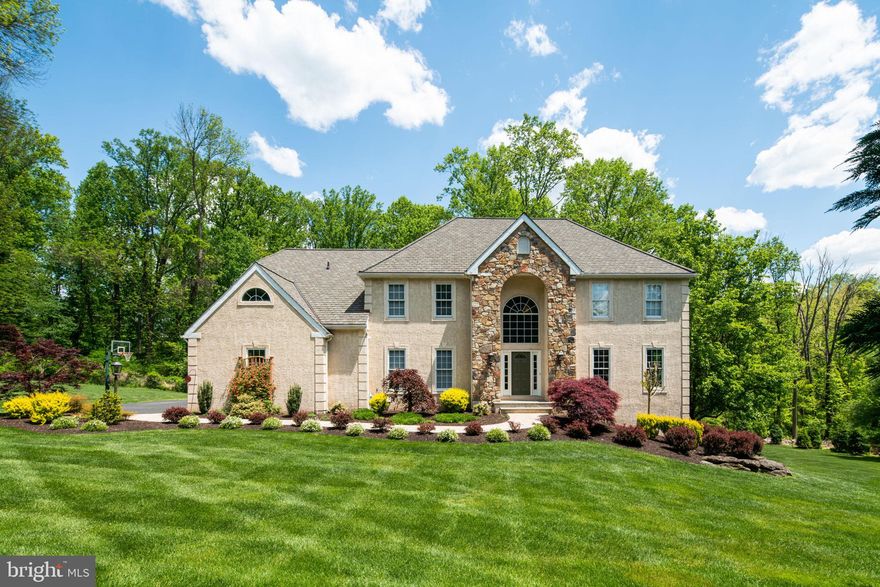 This is an absolutely impeccable 5 bedroom, 5.2 bath home overlooking the Springton Reservoir spanning over 5,500 square feet in award winning Rose Tree Media School District! Immaculately maintained, this picturesque property sits at the end of a super-quiet cul de sac on over an acre of meticulously landscaped land. Enter into the stunning foyer with soaring ceilings and an elegant staircase. To the right you will find the formal dining room with custom wainscoting and chandelier. The massive chef’s kitchen is a true dream with high end appliances, large breakfast bar, desk area, all open to a wonderful family room. In the great room you’ll find soaring ceilings, massive windows and a wood fireplace. Additionally, you’ll find an office with a large bathroom (wheelchair accessible) that could easily be turned into a bedroom. Off of the family room you will find access to the incredible bi-level Duralife deck with custom pergola & fan. This is a truly impeccable entertaining and relaxing area! Dedicated laundry room with granite counters, cabinets and utility sink that leads to the heated three car garage. The second floor boasts the massive primary bedroom with soaring ceilings, huge windows allowing an abundance of natural light, custom chandelier, huge walk-in closet and extra sitting room that could be used as a gym or office, or whatever you desire! The primary bathroom has two toilets, a soaking tub and stall shower creating a true spa-like feel. Also on the second floor are three more graciously sized bedrooms - two bedrooms sharing a recently updated jack and jill bathroom and the fourth bedroom has its own ensuite bathroom that has been recently updated as well. The walkout basement is an entertainer's dream, giving you additional living and entertaining space plus a full bathroom, gas fireplace and access to an additional patio area with a fire pit in the backyard. The basement also features a beautiful full-service bar complete with sink and refrigerator as well as a full bathroom. There is an additional room in the basement that could be used for a bedroom, office, or den. Other amazing features are a whole property sprinkler system as well as an electric fence, new roof with 50 year shingles so no need to worry there! Three zoned heating and AC throughout the home as well as a full home generator. Location can’t be beat! Right by the Springton Reservoir, Ridley Creek State Park, 5 minutes to downtown Media and close proximity to Philadelphia.