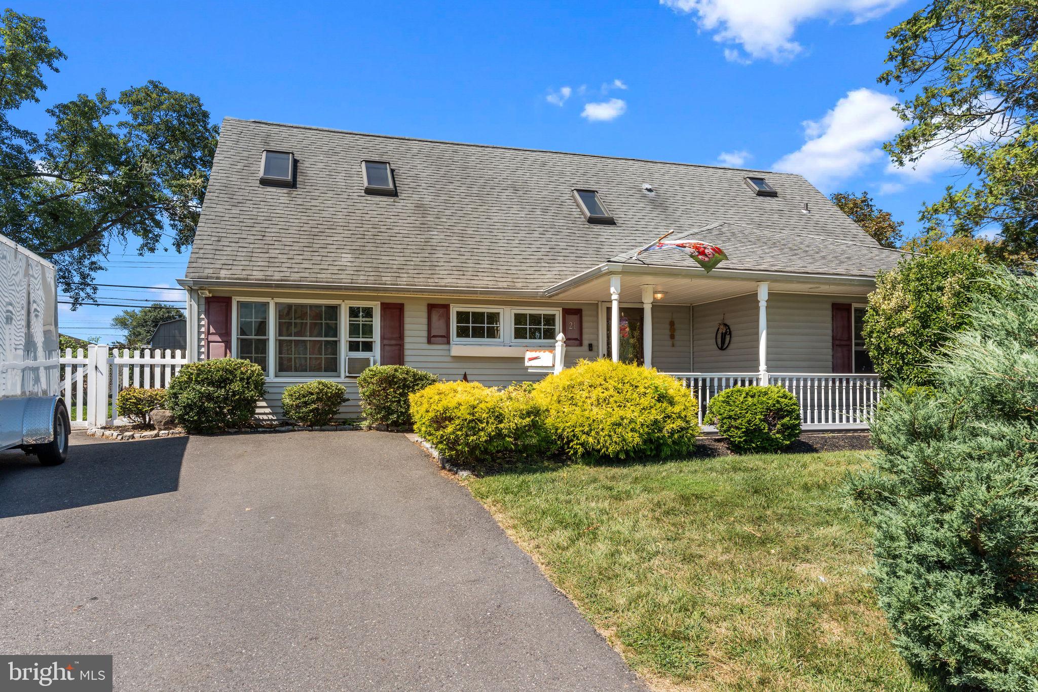 Welcome to 21 Downhill Rd, nestled in the heart of Deep Dale – one of Lower Bucks County’s most desirable and established neighborhoods. This spacious 4-bedroom, 2-bath home offers over 2,000 square feet of thoughtfully designed living space, all within the award-winning Neshaminy School District. With room to spread out and a location that’s hard to beat, this home checks every box for today’s buyers. Step inside to find an inviting open-concept living, perfect for hosting holidays or enjoying everyday family time. The home’s flow is designed for both comfort and connection. The main-level features a huge bonus room providing endless possibilities – whether you need an office, playroom, hobby space, or additional storage. First floor offers living room, separate area for dining, beautiful kitchen, den/office, full bathroom, large first floor bedroom with walk in closet, and an oversized utility room for additional storage. Upstairs features 3 larger bedrooms, a full bathroom, separate laundry room (upstairs for your convenience!) and the most adorable nook space currently being used as a playroom. Outside, enjoy the charm of a welcoming wraparound front porch, ideal for morning coffee or evening relaxation. Low-maintenance EP Henry hardscaping enhances both the front and back yards, offering curb appeal and outdoor living space without the extra upkeep. Beyond the home itself, the location is unmatched – parks, shopping, dining, and major commuter routes are just minutes away, making daily life convenient and enjoyable. With top-rated schools and a community feel that’s second to none, Deep Dale remains one of the most sought-after areas in Lower Bucks. Beautifully situated – 21 Downhill Rd is the kind of home that doesn’t stay on the market long- for good reason.
