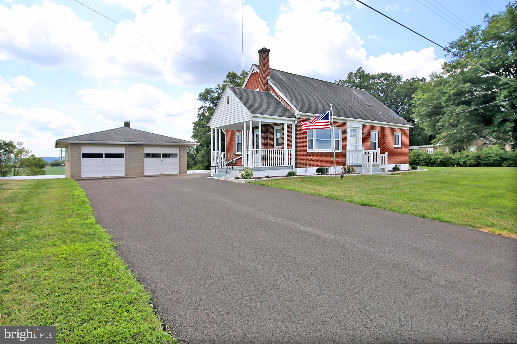 Location! Location! Look out the front windows and see open fields and mountains. Sit in the back yard and watch the planes take flight and land from Fredericksburg Airport! This home's location can't be beat! Northern Lebanon School District, close to all amenities, but still gives you that country feel. This 3 bed, 1 bath brick home will impress with its beautifully restored hardwood floors, massive upstairs primary bedroom, and oversized 2 car garage. Central AC was added in 2025 along with new windows and a newly paved driveway. This home is a must see! It has so much to offer its next owner!