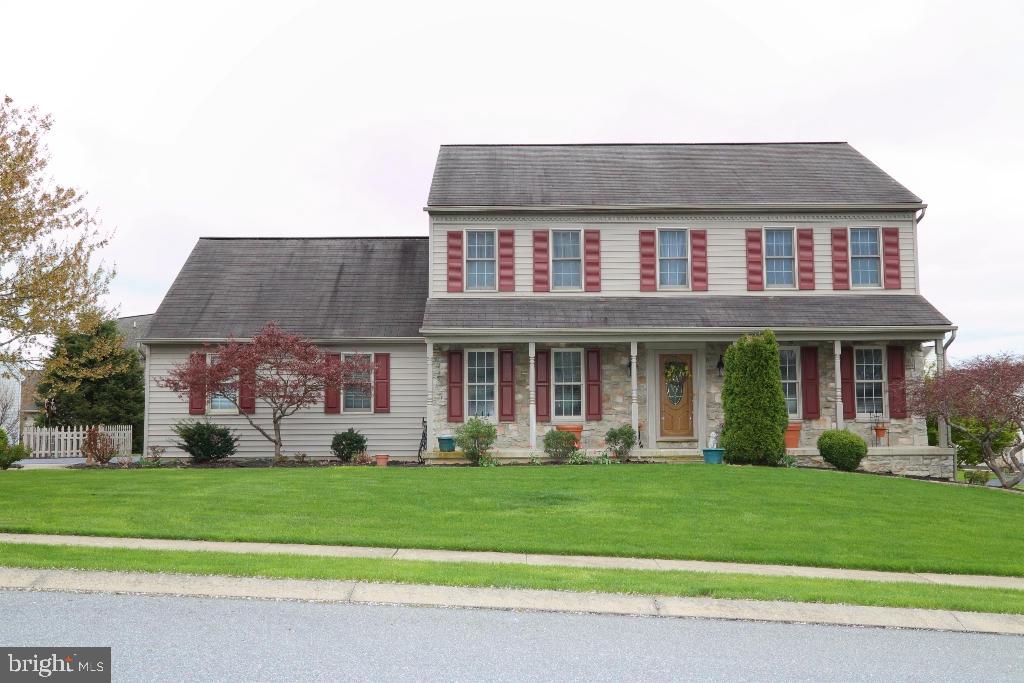 A must see!  Kitchen w/ granite, newer appliances, living room, family room w/ gas fireplace, hardwood floors, additional family/sunroom w/ 2-story stone gas fireplace, LL media room, oversized 2-car garage, beautiful patio for outside entertaining, 4 bedrooms 2 1/2 baths waiting for you in CV School District.  Street lights & sidewalks plus 1,044 unfinished area windows giving you a daylight basement.