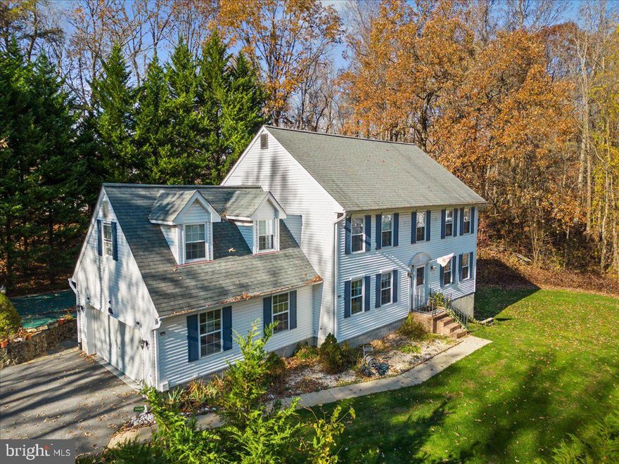 Wow! Great Northern Calvert neighborhood of Victoria Station, private setting with 5 bedrooms ,a lovely pool and hardwoods on top two levels!  All for only $675,000! The main level has an office/living room with built ins along the wall, formal dining room and a kitchen with solid wood cabinets and granite counter tops.  The eat in kitchen adjoins the family room.  Just walk out the kitchen door to your back yard pool  with lot's of entertaining options!  Upstairs features a spacious primary suite with updated bath and 4 other large bedrooms all with beautiful hardwood floors.  Huge 5th bedroom over the the garage is great for an upstairs office, additional family room or another bedroom.  The lower level features a recreation room , full bath and  a work shop areal.  Roof is only a year old, updated top of the line hvac and ready to move right into with fresh paint.  Victoria Station has a community lake with walking trails around it, tennis courts, basketball courts and a new community playground. If you are looking for an active HOA with neighborhood functions, this is a nice mix of privacy if wanted or involvemet if desired.   List upgrades available for the house at request.  Priced to sell at this new adjusted price point!