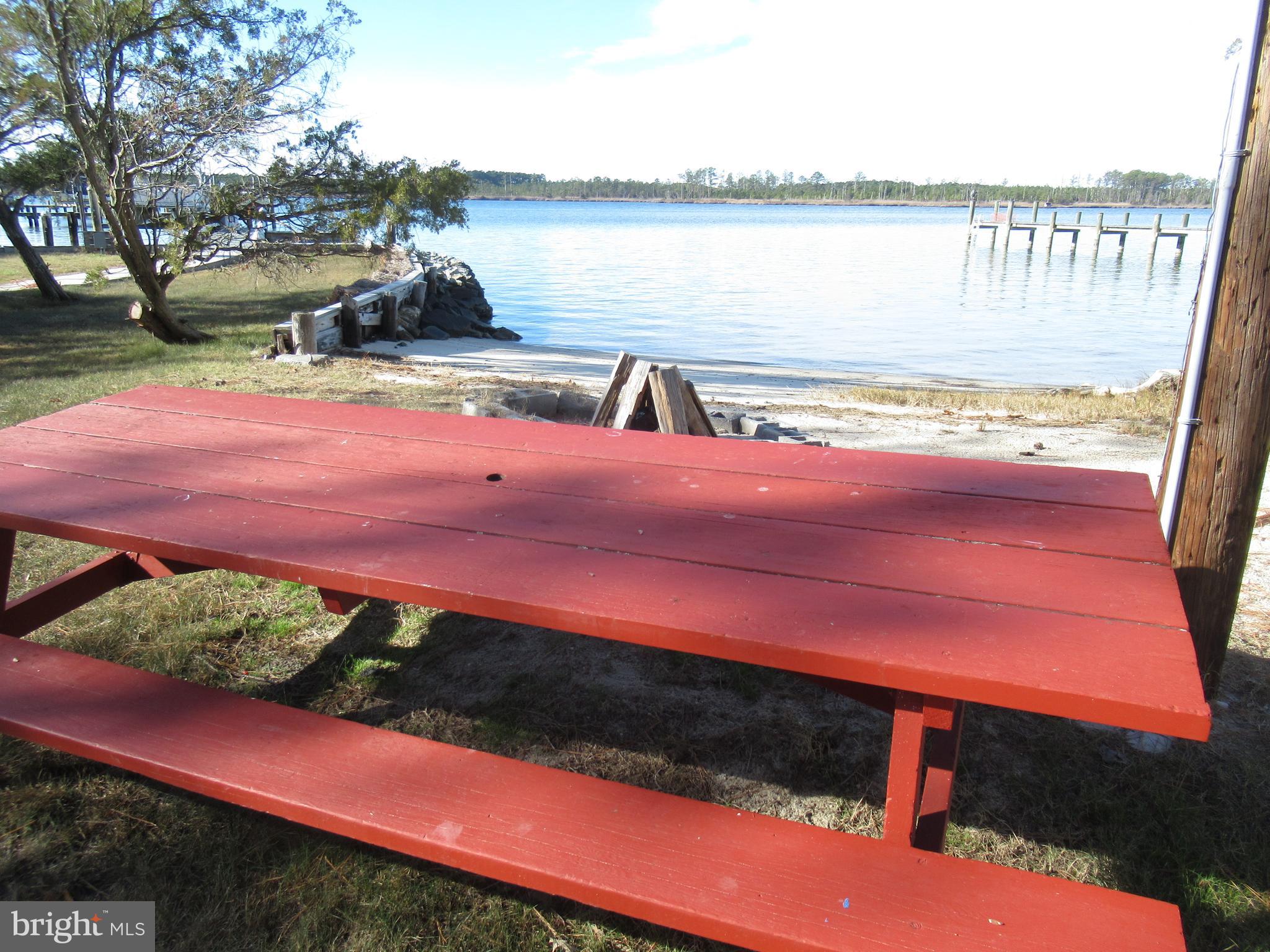 WATER OFF FOR WINTER - GO AND SHOW - GREAT RENTAL HISTORY - This is really two lots # 23 and #24 with an updates septic system for two-bedroom cottage that features a small sandy beach where you can put your boat in and a dock with a lift that can lift a large pontoon boat. the Extra lot you can build your barn on to hold your toys. The house has two bedrooms, a bath and a large family or play room and the eat in kitchen where you can hold court. The car port and the three sheds also can keep toys or fishing gear. More info in the reports section.
115 feet waterfront
1.3 ac +/-
two lots
sandy beach