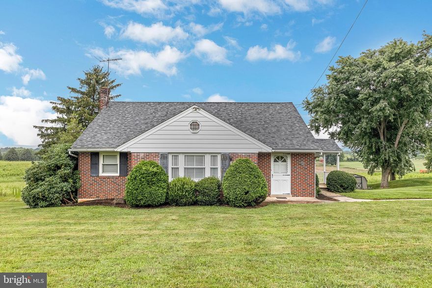 Amazing lot and curb appeal galore as you pull up to this charming brick rancher.  Enter the home into the foyer with convenient coat closet and head right into the light and bright formal living room.  The kitchen features a ceiling fan, electric cooking and leads into the formal dining room.  There are 3 nicely sized bedrooms on the first floor which have ample closet space.  Just down the hall is a full bathroom with shower/tub combo that services the home.  Heading up to the spacious second floor is where you will find the 4th bedroom and lots of extra storage space.  This home has an unfinished, walkout basement which houses the laundry facilities and provides access to the 1-car garage.  This home has many great features including a new split a/c unit, oil heater with newer tank, the roof is only 3 years old, and the lot is absolutely gorgeous.   If you are looking for a new spot to start making memories, in a picturesque setting, look no further because this house is also conveniently located to shopping, dining and so much more.  Schedule your showing today and enjoy the beauty of fall in your new home.