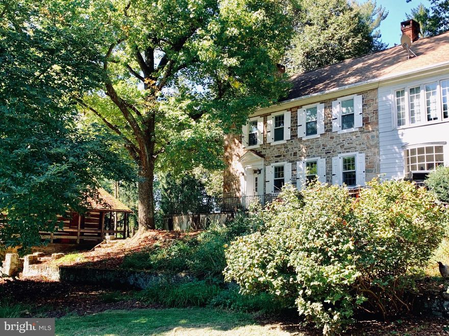 A truly remarkable property, rich in history.   An impressive stone and sculptured gate meet you as you enter the property!  Consisting of a Nineteenth century stone farmhouse AND an Eighteenth Log Cabin (that is suitable for additional living space or guests).  Huge stone bank barn with 4 modern oversized stalls, tack room and wash bay.  New 30x50  oversized detached garage for equipment.  Fenced in pastures, heated inground pool.  Farmhouse boasts a beautiful newer kitchen with propane stove, remodeled first floor half bath, but still has all the charm of the original home including Pine plank flooring, walk in Fireplace, open beam ceilings.  Newer windows flood the first floor with natural light.
3 bedrooms, 2 full baths, and laundry on second floor.  Attic is finished into an adorable 4th bedroom.
The log cabin has a working walk in fireplace, living room, full bath, one bedroom, a  porch  and it also has a basement for storage. Beautiful stone patios, large pond.  Whole house "On Demand" Generator.  This property has long been admired by locals and visitors, now is your chance to own the experience of this amazing home.   Property is enrolled in Act 319 (Clean and Green).  Sellers have all the history, including all past deeds to the property, which will be passed on to the new owners.   All this with very low taxes compared to similar properties in the area!
 Pre-approval or POF must be submitted before approving a showing.