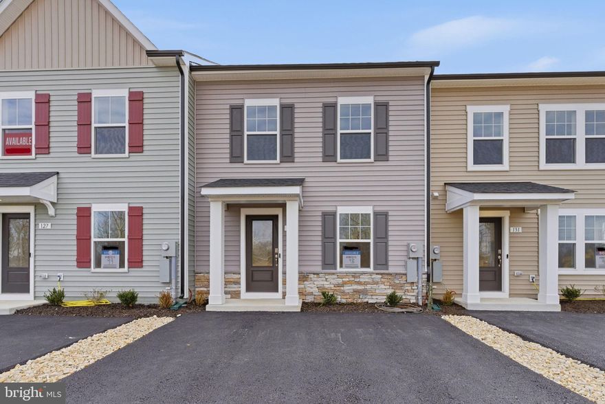 *OFFERING UP TO $12,500 IN CLOSING  COST ASSISTANCE FOR PRIMARY RESIDENCE WITH USE OF APPROVED LENDER AND TITLE.*
Step into this inviting 2-level townhome featuring 3 bedrooms, 2.5 bathrooms, and a spacious, thoughtfully designed layout. The main level offers an open-concept living area filled with natural light, a modern kitchen with gray cabinets, quartz countertops, stainless steel appliances, and a large center island, plus a cozy dining area that opens directly to the backyard. A convenient half bath and additional storage space complete the first floor. Upstairs, you’ll find all three bedrooms, including a generous primary suite with a walk-in closet and private ensuite bathroom. Two additional bedrooms share a full bath and offer plenty of space for family, guests, or a home office. Outside, enjoy a covered front entry and the bonus of an oversized paved driveway that fits up to 4 vehicles.