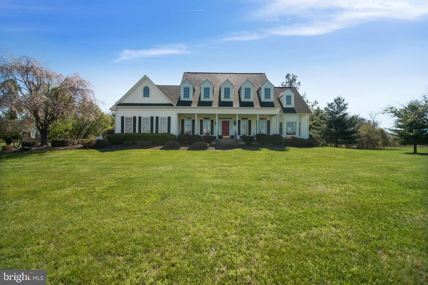 Most towns have a home or two that take your breathe away when you drive by   the kind that makes you say to yourself,  I d love to live there .  Well, this beautiful Round Hill Cape Cod is a show stopper, to be sure.  And now available for sale   it could be yours!Built in 1996, this 4 bedroom/3.5 bath property has over 5000 square feet of comfortable living space on 3 finished levels.  Walk up to the extra deep, welcoming front porch, then as you enter you will be struck by the beauty of the rich, Brazilian cherry floors. Lovely formal spaces and comfortable casual living - all seamlessly blend into one as you walk through the main level. An amazing addition featuring a double- sided fireplace and walls of windows greets you in the back of the home. Add a main level master to the mix. Upstairs are 3 good-sized bedrooms and a full bath, all open to the family room below. The 1700 square foot basement is an entertainer s dream   huge spaces for fun including a media room, large built-in bar, space for both ping-pong and billiards, and an office/library/exercise space and full bath. Lots of natural light down there.Just minutes to Rt 7 for commuting. Low HOA dues of only $50 annually. Flowering trees of all types. A yard perfect for a friendly football game, or for the garden of your dreams. Perfect for a pool.  Endless opportunities!Let your story start here  ..