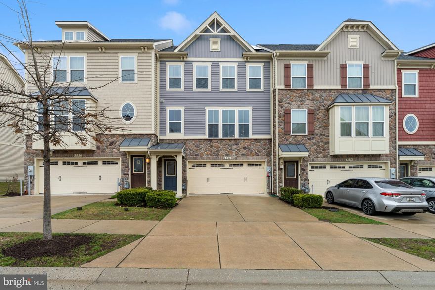 Immaculate 3-level townhome with private driveway and attached 2-car garage. The main level features an open floor plan with hardwood flooring, a spacious family room, and a gourmet kitchen with granite countertops, large kitchen island, stainless steel appliances, gas stove,  breakfast bar, and pantry. Dining area leads to an oversized deck—perfect for entertaining.

Upper level offers 3 bedrooms, including a primary suite with walk-in closet and custom built-ins, plus a private bath with double vanity, soaking tub, and separate shower with built-in seating. Two additional bedrooms, hall bath, and convenient upper-level laundry complete this floor. The property also has Solar Panels!

Lower level includes a rec room with walk-out access to the backyard and garage entry.

Community amenities include pool, gym, playgrounds, and clubhouse. Convenient location with easy access to Fort Meade, Baltimore, Annapolis, and major commuter routes.