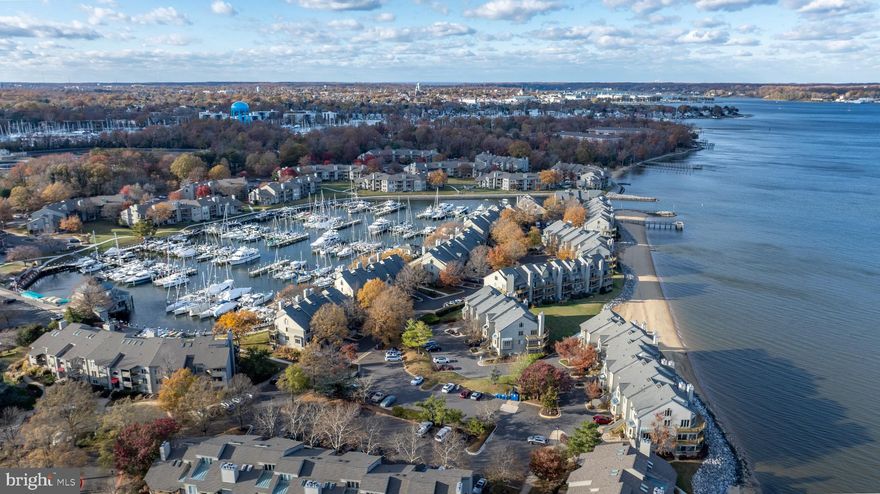 Welcome to the gated community of Chesapeake Harbour, offering a stress-free lifestyle!
This second-floor condo features two balconies. The large wrap-around balcony provides stunning views of the marina, while the second balcony, located off the kitchen, offers views of the bay.
Inside, the main level features an open-concept living area and a spacious kitchen with stainless steel appliances and abundant cabinet and counter space. The primary suite is also located on this level.
Up the beautiful spiral staircase, you will find a loft/bedroom and an additional sitting area.
Chesapeake Harbour provides residents with a swimming pool, tennis courts, a beach, and much more. You are also within walking distance of the marina, shopping, and restaurants.