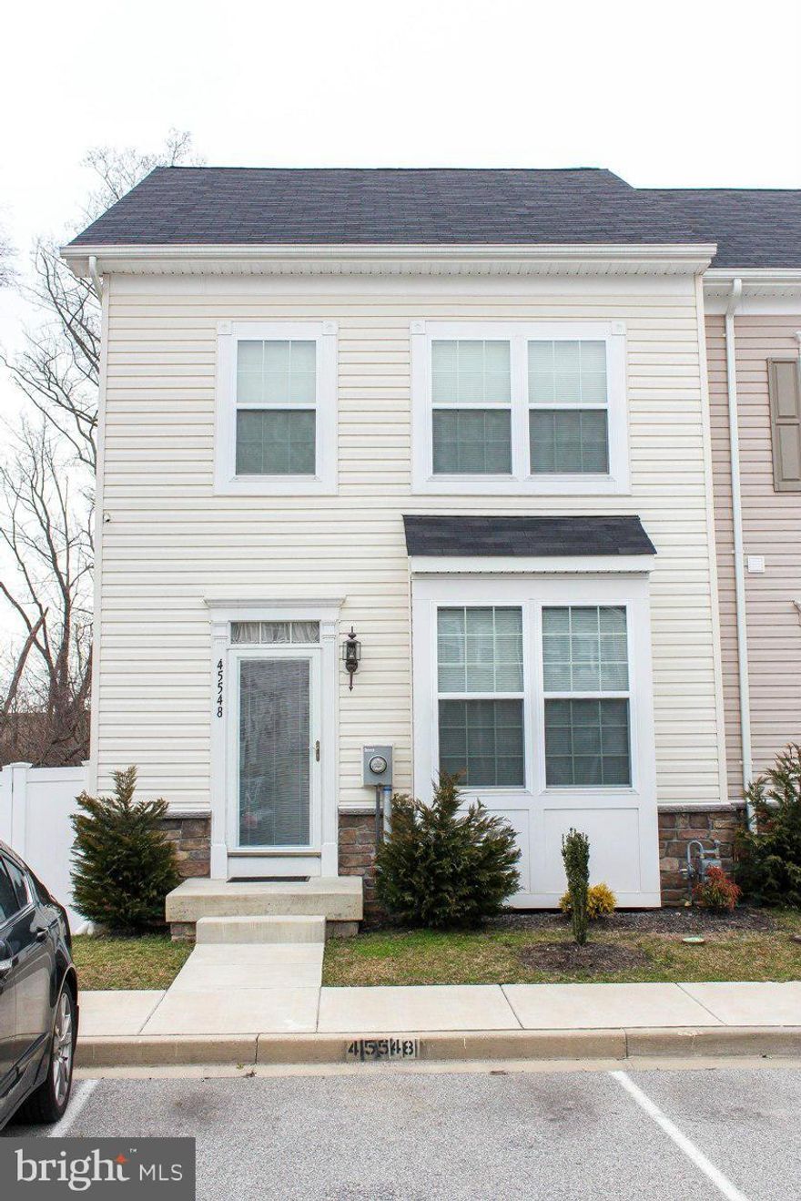 Beautiful like new end unit townhome, last built in the community. Immaculately kept, open concept living w/ stainless steel appliances & a beautiful deck over-looking the trees for relaxing outside entertaining. Beautifully finished basement w/laundry & add. bedroom. Back & side yard are enclosed by vinyl privacy fence. Trash removal included. Convenient to shopping, PAX & restaurants. Come see!