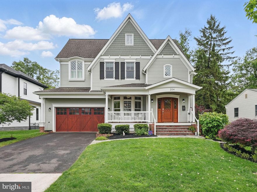 Welcome to your future home at 204 Elm Street in charming Vienna! This custom built craftsman boasts 4 cozy bedrooms and 3 full bathrooms, perfectly nestled on a gorgeous lot. Just a stone's throw from town, you'll love the convenience of this prime location. Enjoy the warmth of the fireplace in the inviting living room offering views to the lush backyard. The gourmet kitchen offers stainless steel appliances with  decorative back splash and a large eat in island. A separate formal dining room with a view out over the covered front porch offers space for entertaining and the main level office adds functionality. The primary suite is lined with large windows for scenic views and has a dressing area, large walk in closet and en suite luxury bath suited perfectly for serenity at home. Retreat to the spacious basement for added living space and storage with exterior access to the rear yard. Every detail in this home was thought out for charm,  comfort and convenience from the ramp leading from the garage to the rear door entryway, to the Geo-thermal system installed.  Whether you're relaxing in the peaceful backyard or exploring the vibrant local community, this home offers the ideal blend of comfort and accessibility. Don’t miss the chance to make this delightful space your own! Vienna Woods Pool Membership Available.