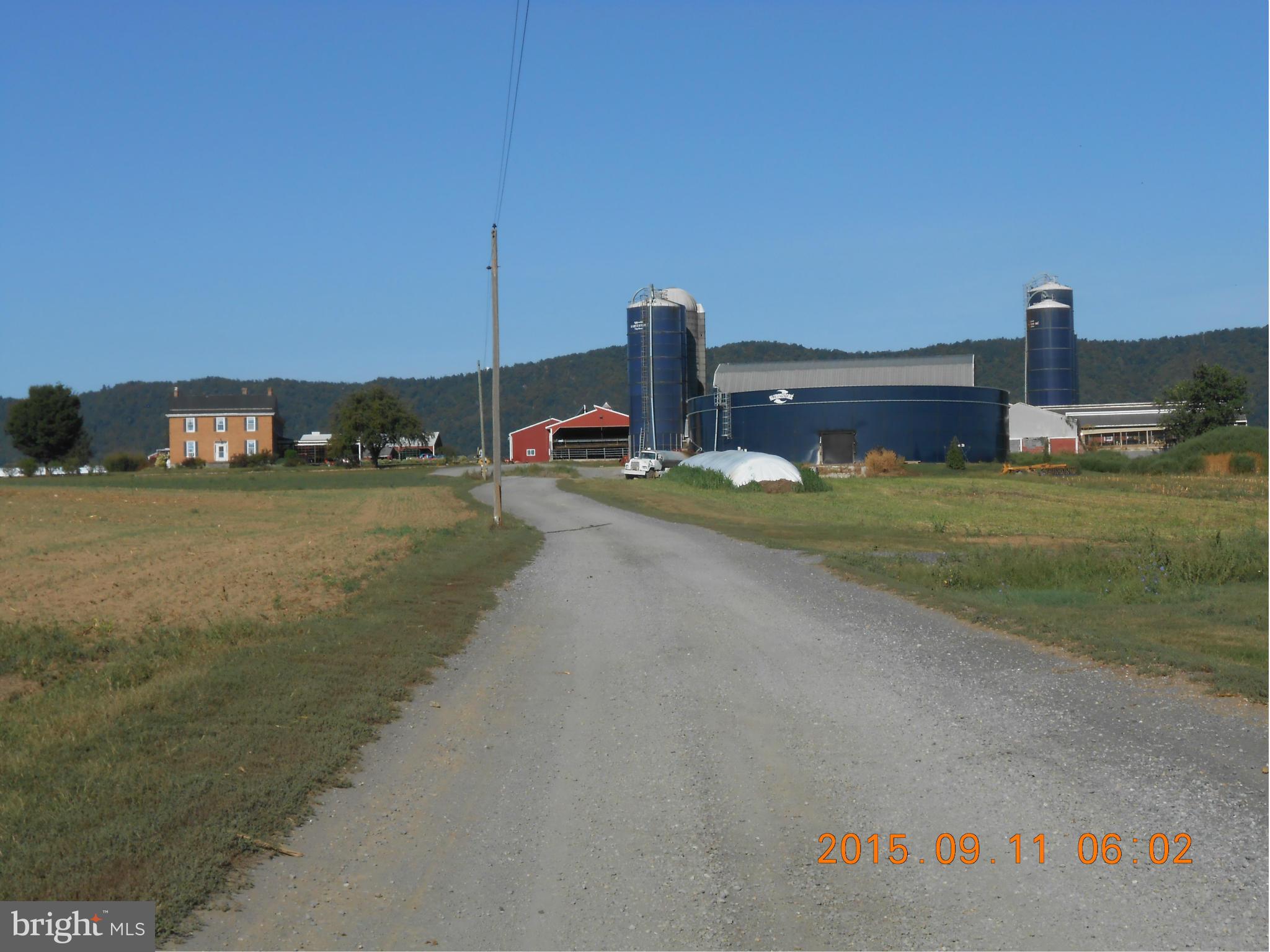 You will never tire of the view from this 335 acre turn key dairy farm sitting half mile from the main rd. Limestone soil,Double 12 milking parlor, 200 plus free stalls,TMR Mixer,Modern manure storage, Calf and Heifer raising facilities,Machinery storage and workshop. 1840's Brick home with 4 bedrooms, 3 bathsand 3 car garage.Family retiring from farming, so here is your golden opportunity!!