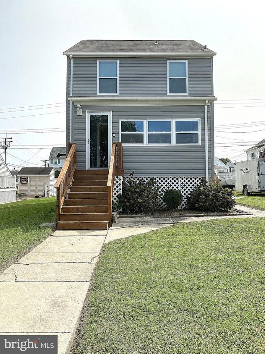 This delightful 3 bedroom/2 bath home is located on the much desired Edgemere / Sparrows Point peninsula.    Major updates have been made throughout this home in the last few years.  Siding, Windows, Dual Zoned HVAC, flooring, doors, carpet and some fresh paint.  Updated kitchen with great solid surface counter space, plenty of cabinets and stainless appliances.  There is not just 1 but 2, updated full baths.  Cozy up to the pellet stove in the winter or just turn it on and reduce your heating cost.  The super cute front porch provides a awesome space to relax and enjoy your coffee.  Located only a minute from I695 and just a few minutes from Tradepoint Atlantic , this home has a spectacular price for the area.