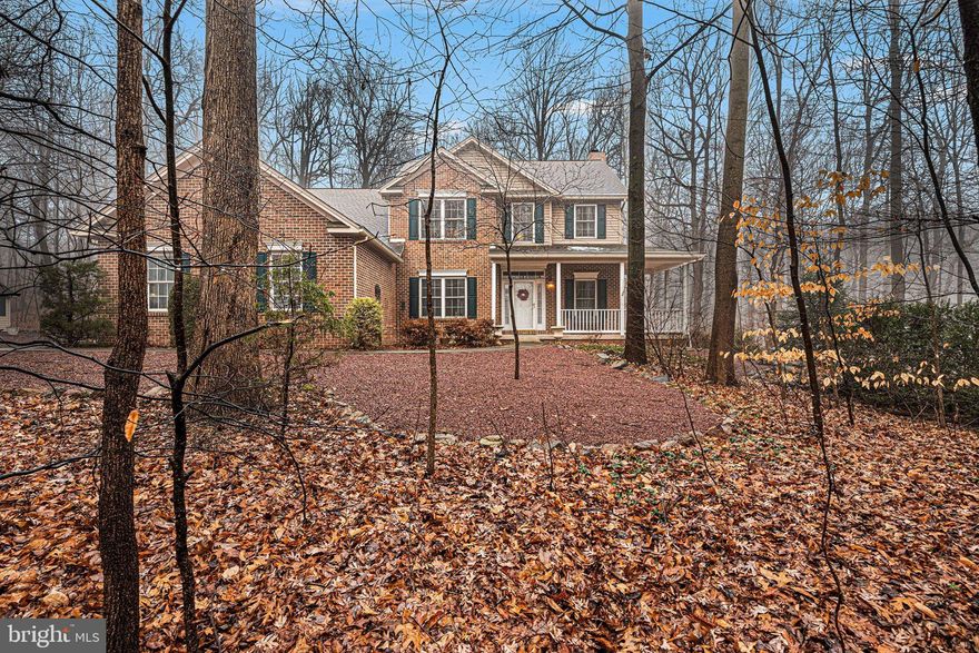 Welcome home to this beautifully maintained S&A–built residence set on a peaceful 1.02-acre lot, offering 3,005 square feet of thoughtfully designed living space. This 4-bedroom home  features a spacious loft and 2.5 baths, providing flexibility for everyday living, guests, or work-from-home needs.

The impressive two-story foyer sets the tone and opens to formal living and dining areas, highlighted by a tray ceiling in the dining room. The heart of the home is the well-appointed kitchen, complete with cherry cabinetry, granite countertops, tile backsplash, under-cabinet lighting, a pantry, and a commercial-grade range hood. The kitchen flows seamlessly into the living area with a wood-burning fireplace, creating a warm and inviting space to gather.

Convenience meets comfort with a first-floor primary suite featuring two closets and a spacious en-suite bath with dual vanities, a soaking tub, and a walk-in shower. A first-floor laundry room adds to the home’s functional layout.

Upstairs, you’ll find additional bedrooms along with a large loft that can serve as a second living area, home office, or recreation space. Outdoor living is equally inviting with a composite deck overlooking the private, wooded setting. A three-car garage and a newer 10x14 storage shed provide ample storage.

Additional highlights include a sump pump, active radon mitigation system, Kinetico water treatment system serviced by Martin’s, and heat and air installed in 2013. 

This home offers space, quality construction, and a serene setting—an exceptional opportunity for buyers seeking both comfort and privacy.