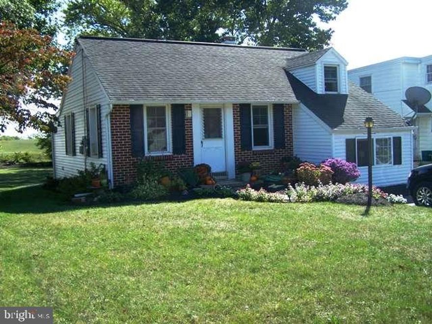 Charming split level home with great setting. Yard back to farmland and church parking on level lot. Many newer amenities such as newer windows, water heater, furnace, and roof. Off street parking for 4. Country setting, neutral colors and much more. Square footage is approximate.