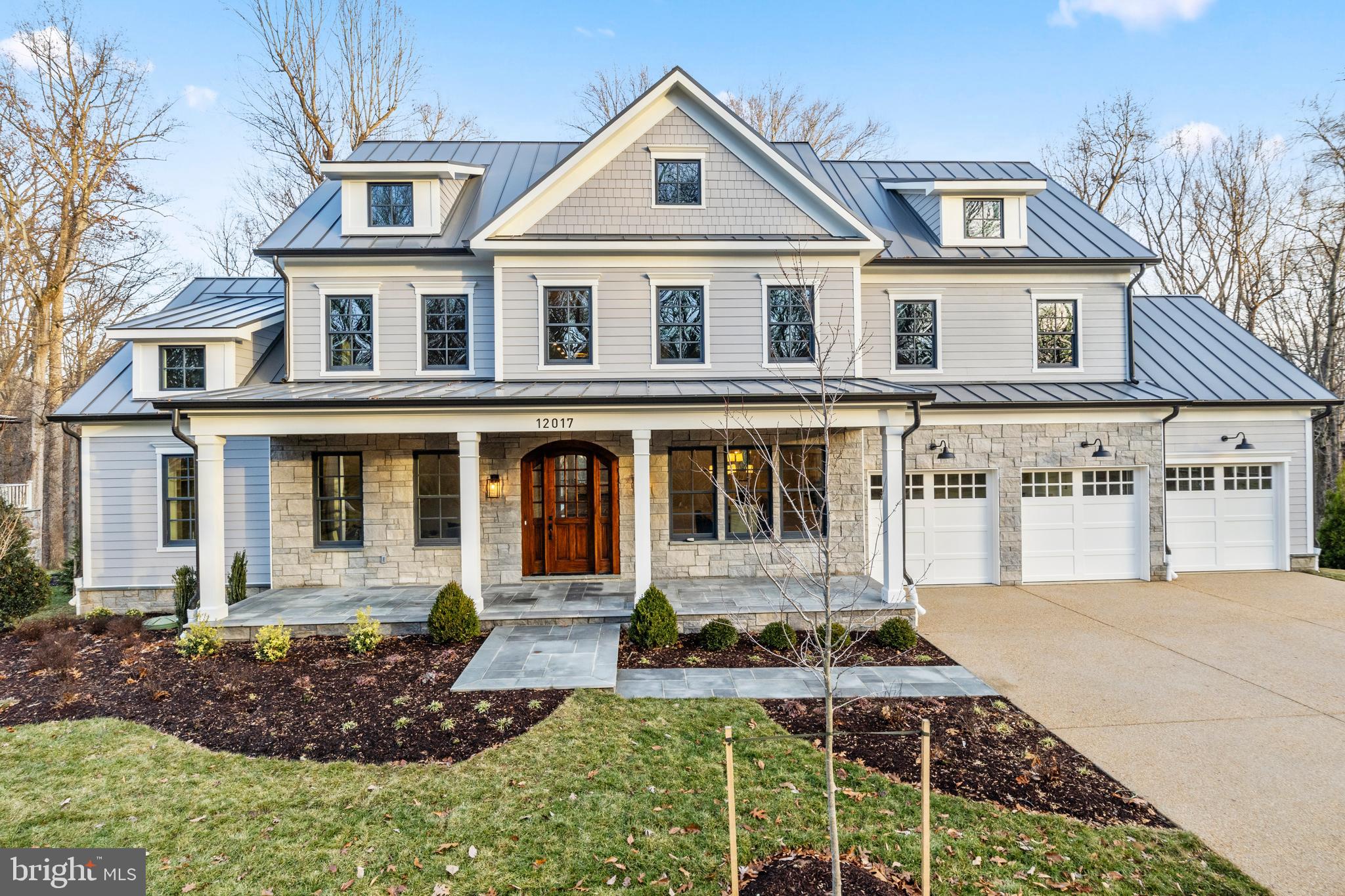 Discover the rare opportunity to own a brand-new custom home in the prestigious Merry Go Round Farm community—a secluded 204-acre haven adjacent to the scenic C&O Canal National Park. Thoughtfully designed, this one-of-a-kind residence offers a luxurious main-level owner’s suite featuring a spa-inspired bath and expansive custom walk-in closets.
Enter through a dramatic foyer with soaring ceilings that lead to elegant formal living and dining spaces. The gourmet kitchen opens to a charming breakfast nook and a stunning two-story family room, where twin sets of French doors unveil a spacious deck and sweeping views of the verdant landscape—perfect for entertaining or quiet enjoyment.
This flexible floor plan accommodates both grand entertaining and daily comfort with features like a three-car garage, generous mudroom, dual laundry rooms, a dedicated exercise room, optional wine cellar, and space for two home offices. Each of the six bedrooms includes its own en-suite bath, ensuring privacy and comfort for all.
Merry Go Round Farm is a community where nature and architecture harmonize. This home has been strategically placed to capture ideal sunlight and tranquil views of the surrounding woods and a gentle stream. Located on Evening Ride—a peaceful cul-de-sac with only five homes—this setting offers unparalleled privacy.
The community itself is rich with amenities, including an equestrian center with pristine stables, forested trails for walking, running, or horseback riding, illuminated tennis courts, and serene lakes and open fields for a range of outdoor activities. Whether your passion is riding, hiking, tennis, or kayaking, life at Merry Go Round Farm offers a unique blend of luxury living and natural beauty.
Seller financing for this unique property is available at competitive rates. Please contact the listing agent for details.