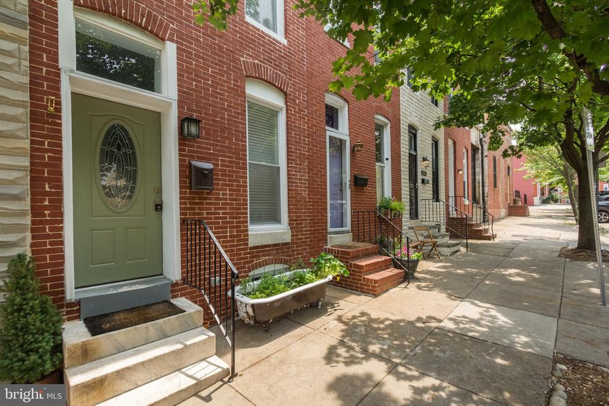 Beautifully renovated home on a tree-lined street of Butchers Hill. The house offers spacious and airy first level with an open floor plan, hardwood floors, exposed brick, renovated kitchen with granite and stainless steel applianced. Second floors offers 2 bedrooms with 2 full bathrooms. Finished lower level could be used as a guest bedroom, office or a den. Close to Johns Hopkins, Fells Point, Harbor East and Canton. Available for immediate occupancy.