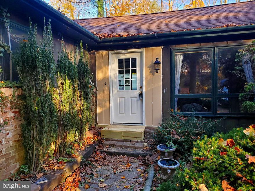 Walk right in to this 3 bedroom, 1.5 bath ranch located in Southern Lehigh SD, on almost 3 acres! This beautiful wooded setting and quite road is a rare find. This home needs some TLC, but it will make someone a beautiful home! It contains an eat-in kitchen, dining room and living room with a vaulted ceiling with exposed beams, fireplace and brand new laminate flooring. The powered, detached 2 car garage is extra deep for storage. Seller will consider repairs and credits on a case by case basis. This home needs renovations, many have been started, and will be a great place to live with a little help.