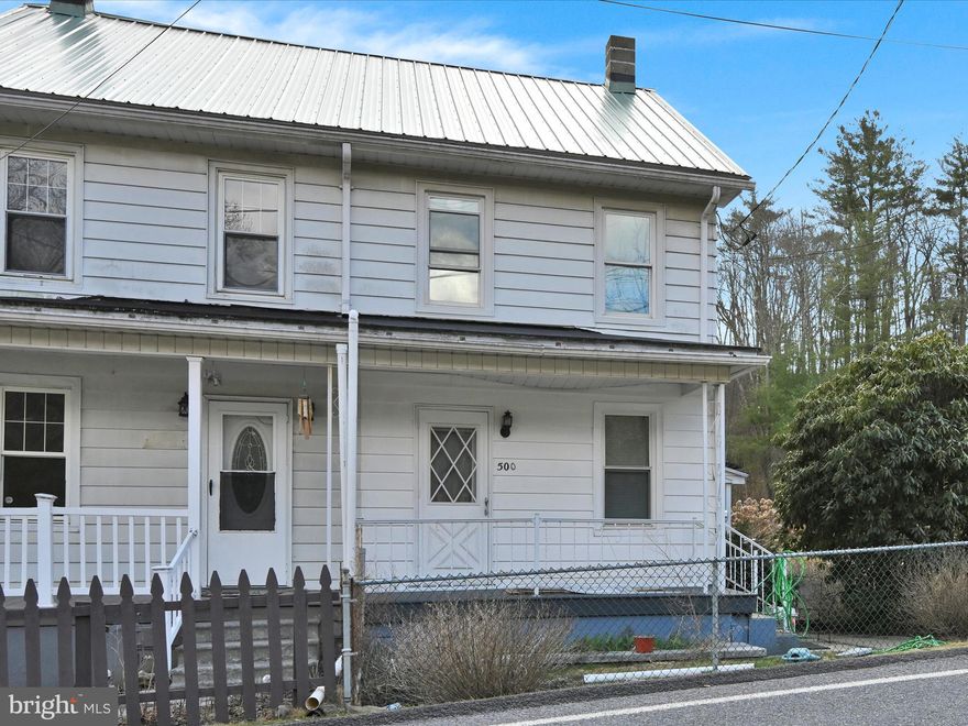 Welcome to this two bedroom, one bath semi detached home located in Cass township, Minersville School District.  Featuring a newer metal roof installed in 2014 and leased solar panels to help with energy efficiency, this property is a great opportunity for homebuyers or investors alike. Inside you’ll find a heated mudroom for additional storage which opens to the spacious eat in kitchen. The open floor plan with a combined dining and living room area is highlighted by hardwood floors and built ins that add lots of character and charm. Step outside to enjoy a spacious fenced backyard - perfect for outdoor gatherings, pets, or gardening. Inside, the home offers solid bones and plenty of potential with room for rennovation and customization to make it truly your own. Don’t miss your chance to bring your vision to life in this conveniently located home with great outdoor space and long term potential.