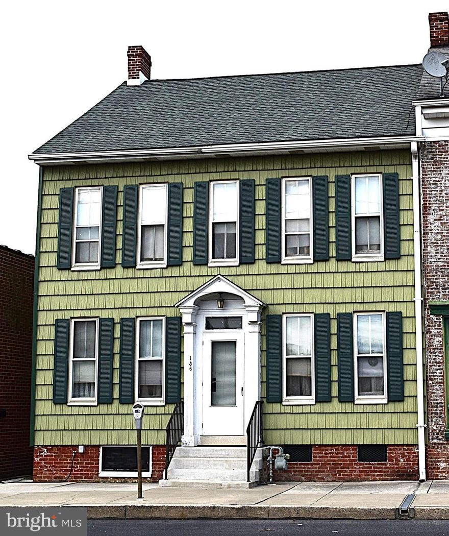 Large home with updated kitchen and 2 bathrooms. Large rooms and lots of space, first floor laundry and full walk up attic. Nice sized back yard and a detached garage with room for 2 cars but one overhead door.