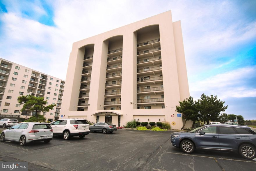 This luxurious, direct oceanfront, end unit , never rented condo is a rare find.  Located in the highly sought after Camelot building A. The community offers a private beach entrance, Olympic size swimming pool and tennis courts and ample parking.  Current owner took the unit down to the studs and replaced all electrical, plumbing, windows and sliders, flooring , kitchen and baths.  Two of the bedrooms have King sized beds and attached full baths.  The 3rd bedroom has 2 twin beds that could be bunked if desired.  An open floor plan allows for easy entertaining of family and friends.  The extra large and private balcony is big enough for dining and lounging to enjoy  anytime of the day or evening.  Don't let this one get away, make your appointment today!  Showing begin on Sept 5th.
