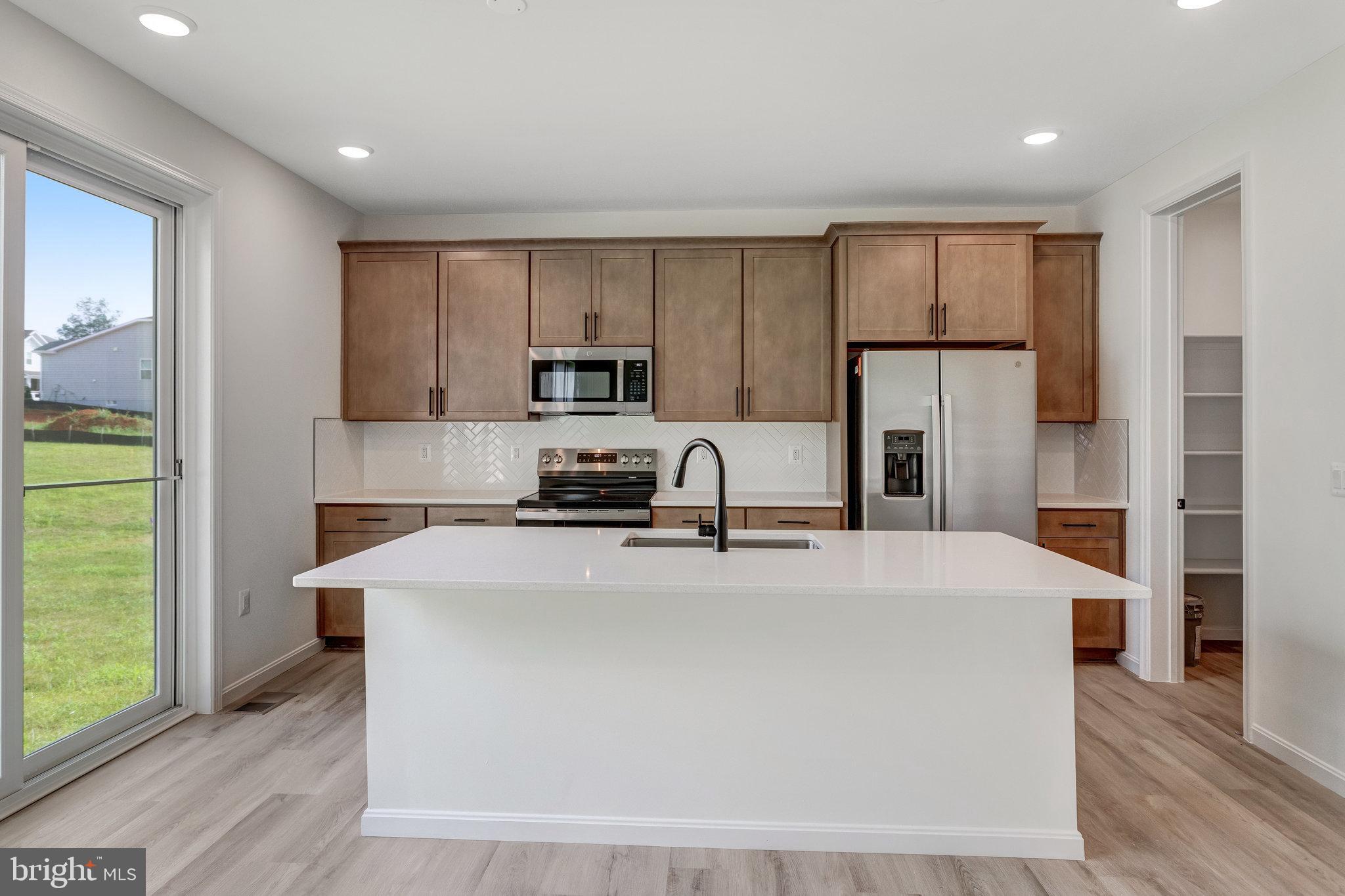 SEASONS AT ROUND MILL MEADOWS - Residential