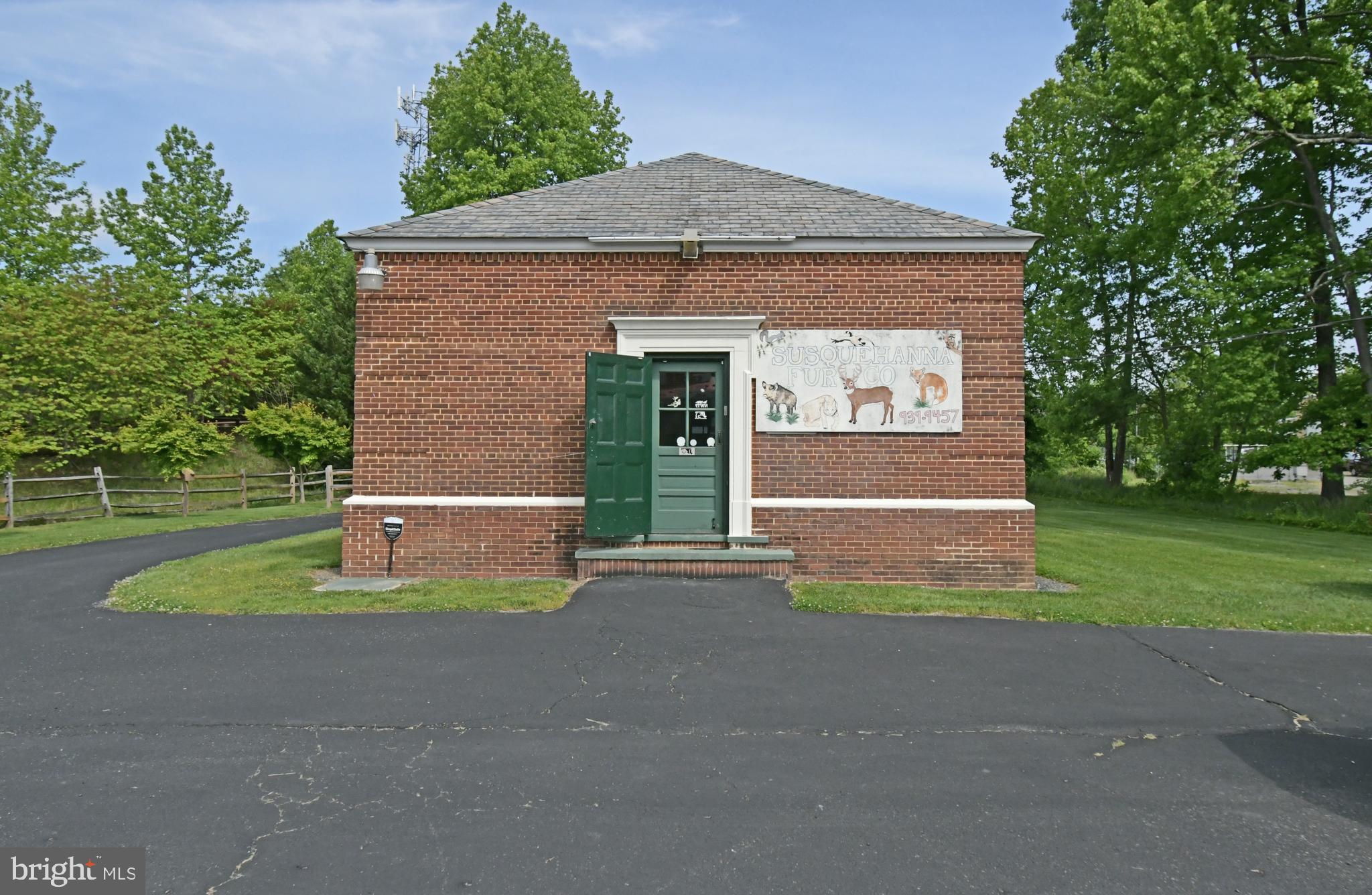 Solid, all brick, 1,274 square foot building with slate roof, positioned on .34, level acres. Includes 2 storage buildings (a 20'Long by 8" wide storage container and a 16' x 8' shed) Ample off-street paved parking. Currently used as a taxidermy shop. Lots of possibilities. Zoned CI with Harford County Zoning. 2- 200 Amp electric service. Visibility from a busy 4 lane highway. Located at the entrance to growing development of Greenway Farms. Close proximity to City limits of Havre de Grace and Aberdeen. Convenient to Aberdeen Proving Grounds. Public water, private septic system. Public Sewer is available.