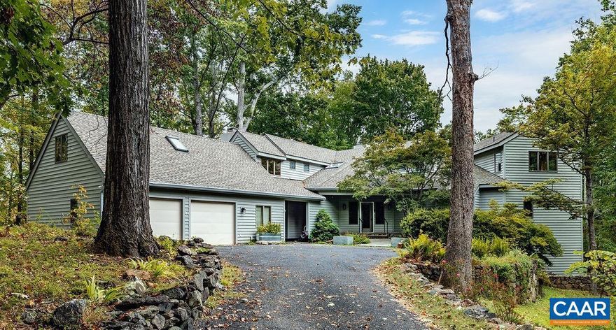 Step into serenity with this extremely private 4BR/4BA lodge on 5.5 wooded acres in the highly sought-after Stoney Creek neighborhood. Built by local builder Roger Gunden, the 3-story home offers en-suite baths & walk-ins for every bedroom. The upstairs master is a treetop retreat with sunrise views, vaulted ceilings, a soaking tub, tiled shower, and a wardrobe with 3 separate storage areas. Multiple living spaces include a great room with stone fireplace, family room with soapstone floors & 2nd fireplace, library with built-ins & wood stove, and bonus room above the 2-car garage. A solarium, office/flex space, and garage workshop add even more versatility. Outdoor living includes a fully fenced yard with 3 decks, a screened gazebo with porch swing, fruit trees (cherry, fig, peach, plum, persimmon), berry bushes (blueberry, raspberry, trentberry, jostaberry), and a mushroom cave with shiitake, lion?s mane, nameko & oyster. Extra neighborhood amenities include 3 pools, lakes, hiking, and golf. Priced to sell, you don?t want to miss this amazing opportunity! Schedule your tour today.,Granite Counter,Oak Cabinets,Fireplace in Family Room,Fireplace in Living Room,Fireplace in Study/Library