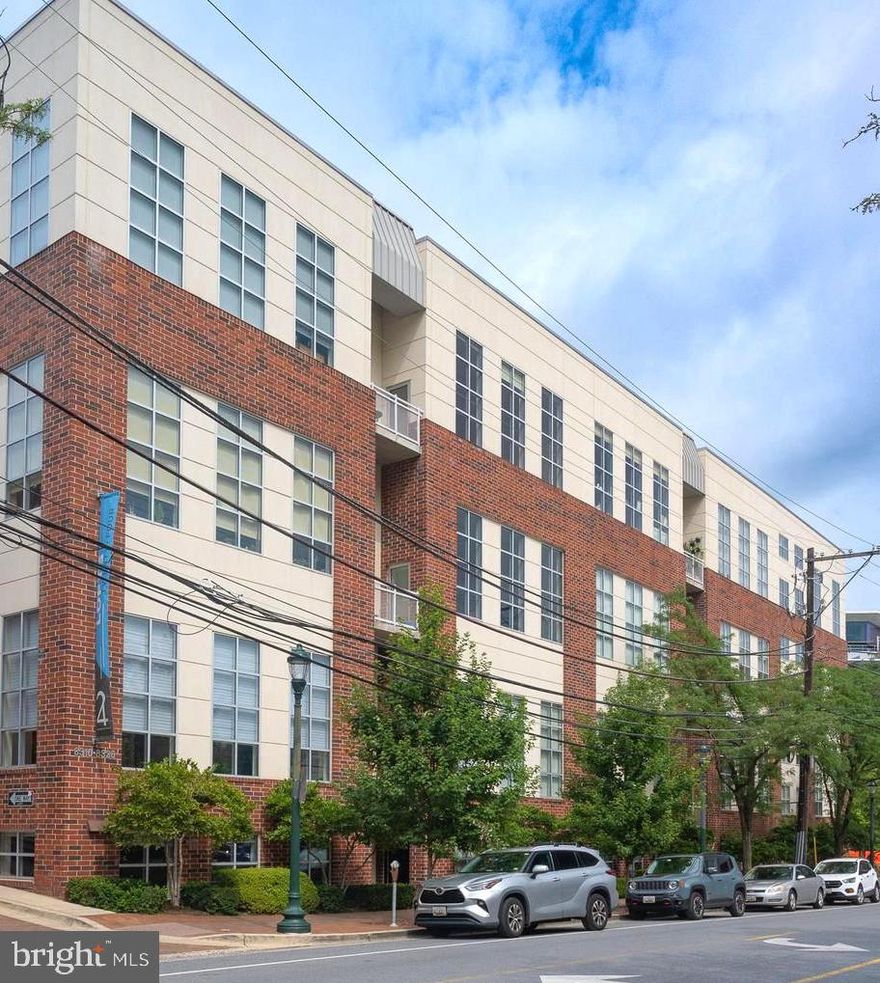 Rare corner unit and one of the largest floorplans in the building, this two story loft in the heart of downtown Silver Spring is enhanced by a loft expansion and features dramatic floor to ceiling windows that highlight the home’s impressive volume and abundant natural light. Soaring ceilings and an open concept layout create spacious living and dining areas that are bright, airy, and highly functional for both everyday living and entertaining.

In addition to a private den, the newly expanded upper level loft overlooks the main living area, enhancing the home’s open, architectural character. These flexible spaces are well suited for a home office, reading area, meditation, creative use, or guest accommodations.

A private balcony extends the living space and provides an inviting outdoor retreat.

Located just blocks from vibrant downtown Silver Spring, the home offers convenient access to the Metro train hub, dining, shopping, and entertainment, supporting a highly walkable, commuter friendly lifestyle.

Additional features include in unit laundry and an assigned parking space.