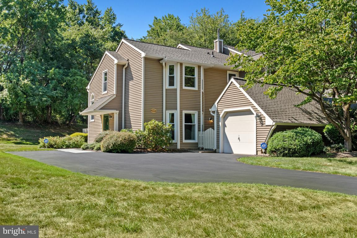 Welcome to 1569 Applewood Circle nestled in the Gold Star-awarded community of Tanglewood in Lower Makefield Township, this spacious 2-bedroom, 2.5-bath townhome offers comfort, style, and an unbeatable location. Tanglewood residents enjoy exceptional amenities including a clubhouse, swimming pool, tennis courts, pickleball, and more – all just minutes from Route 1, I-295, shopping, restaurants, and commuter rail lines. This end-unit home offers privacy and convenience with a fenced-in backyard, featuring a large Tamko deck – perfect for outdoor entertaining. The one-car garage includes pull-down attic storage, and the extended driveway easily fits up to six vehicles. There’s also ample community guest parking nearby. Inside, the entry foyer welcomes you with two oversized closets for coats and additional storage. The main level boasts a sun-drenched living room with soaring cathedral ceilings and a wood-burning fireplace, a formal dining room with sliding glass doors to the backyard, and a spacious kitchen with an island and newer stainless steel appliances. Sliding glass doors off kitchen lead to a private patio. Perfect place to enjoy your morning coffee or tea. A versatile bonus room on the first floor is currently used as an office/den but could be converted into a third bedroom if desired. A large laundry room with a brand new washer and dryer, along with a powder room, completes the main floor. Upstairs, the primary suite impresses with a walk-in closet and en suite bathroom featuring a double vanity and soaking tub. A generously sized second bedroom with a double closet and a full hall bath offer space and flexibility for family or guests. Recent major upgrades include: New roof (2020) New water heater (2020) Top-of-the-line Carrier HVAC system (2023) with humidifier and UVC purifier. This lovingly maintained home is truly move-in ready – just bring your personal touch! Don’t miss the chance to live in one of Lower Makefield’s most sought-after communities.