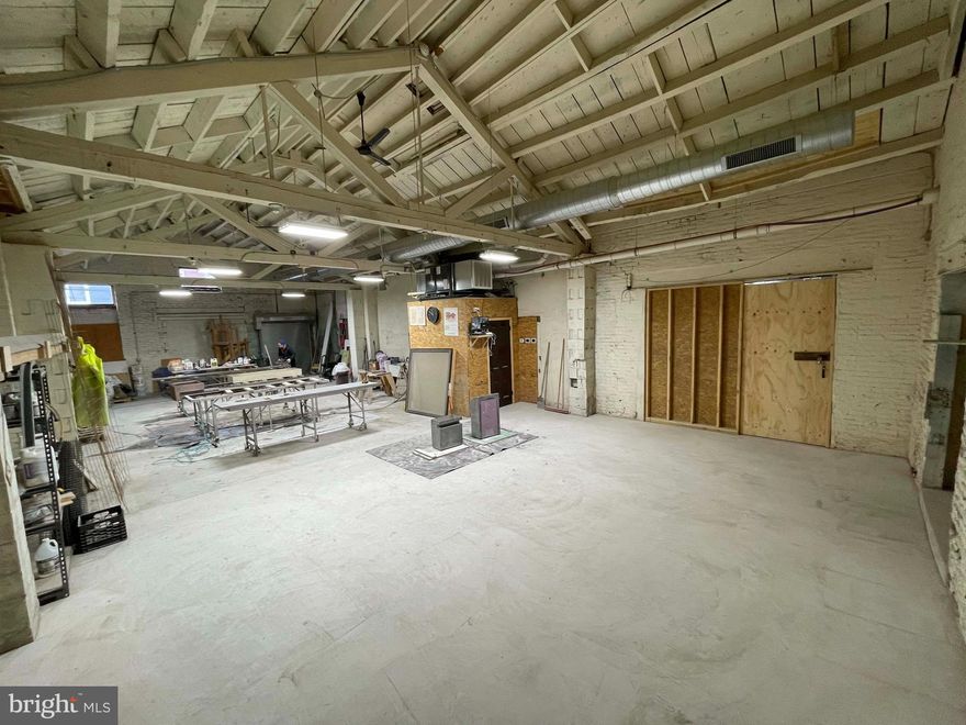 From Craftwork Design: Here is a large space with tall ceilings, concrete floor, and loading dock at 2817 Helen Street Phila PA 19134. Building is home to the Queer Candle Warehouse production studio and has a lovely courtyard entry. This is ground level with loading dock from front sidewalk. Great heating and A/C, security system and bathroom. High Voltage Line (230v) already installed Security, First and Last Month Rent Deposit Needed for Move-in. Cost of Internet / Alarm System / Water / Sewer / Heating and AC will be Tenant Responsibility as a set monthly costs. This is west of Port Richmond, in Kensington - a short walk to Lehigh Avenue. Right next to Queer Candle Company (space smells heavenly round-the-clock). NOTE** Not Permitted under the Zoning: Auto detailing, Auto body, Club or Lounge, Tattoo Services, or Food Preparation.