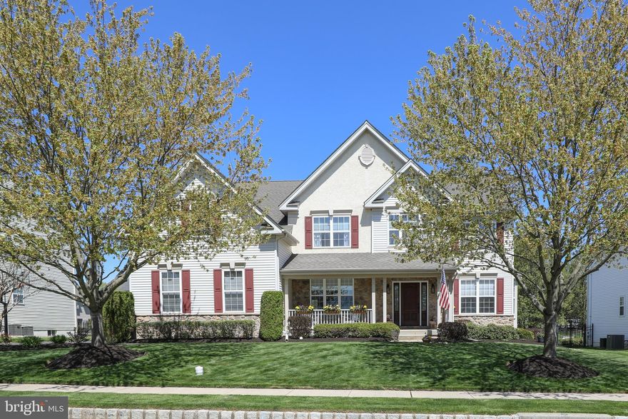 This home will IMPRESS the most particular buyer.  Lush manicured lawn, floral gardens, front porch views of the community’s green space, mile long walking trail and the best of the best Bucks has to offer- rolling hills and panoramic vista of conservation preserved farmland. As you enter this impeccably maintained home notice the many architectural features:  flowing floor plan, exceptionally detailed millwork, diagonally designed hardwood flooring and expanded family room.  The welcoming foyer sets the tone for this home.  Perfect in every way.  Natural light illuminates the interior of the formal living room with crown molding through the floor-to-ceiling bay window.  The formal dining room with new designer chandelier, crown molding, wainscoting and calming outside views will impress your guests on any occasion.  The pass-through butler pantry with ample cabinetry will serve the many needs of formal entertainment. The kitchen, the heart of the home, will please any “culinary artist” with many separate working areas, center island that seats four, double ovens, SS appliances, abundant upgraded Yorktown cabinetry and specialized features for your meal preparation.  The expanded, elevated breakfast bar provides additional seating.  The flow of the kitchen is complete with the adjacent morning room with cathedral ceiling and newly designed chandelier.  Early morning or late afternoon enjoy the streams of sunshine from the array of windows.  Relax, time to unwind—mealtime.  The adjoining expanded two-story family room boast diagonal hardwood flooring with newly installed inlaid Masland carpeting, two skylights that offer natural lighting, ceiling fan, corner windows with transom toppers and the focal point of the entertainment center the fireplace.  A spacious first floor office offers privacy and versatility. Powder room and laundry room complete this level. Enjoy the convenience of the back staircase from the kitchen area. The second-floor hallway and overlook balcony to the family room gives the owner’s suite separation and privacy from the three sizable bedrooms.  This well-designed oasis with custom tray ceiling/lighted ceiling fan, adjacent sitting room, two separate large walk-in closets and an ensuite full bath with water closet, Jacuzzi tub, shower and double vanity area will provide the perfect start to the day.  Each of the spacious bedrooms includes a lighted ceiling fan and double closet. Want extra space? The mini office or study nook is convenient to all three bedrooms. The lower level with half bath, three wall windows and walk-up egress to the extensive patio is flexible for your own customization. It is that time of year… outside entertainment at it’s best.  Enjoy the solitude of your own backyard with a specially designed stamped concrete patio for that end of the day summer retreat. Features to be noted: 3 zone HVAC-2020, Air Dust Free Active Air Purifier, extra height in the basement and extended square footage from family room and morning room, custom Hunter Douglas blinds, custom draperies,  new chandeliers and Bradford White Defender Energy Save Gas Hot Water System-2021. This sought after community offers beautiful sunsets, three gazebo parks, tot lot/playground and a mile walking trail. Devonshire Estates is nestled within the Central Bucks top-tier educational school district, short distance to historic downtown Doylestown and all local venues. WELCOME, YOU ARE HOME.