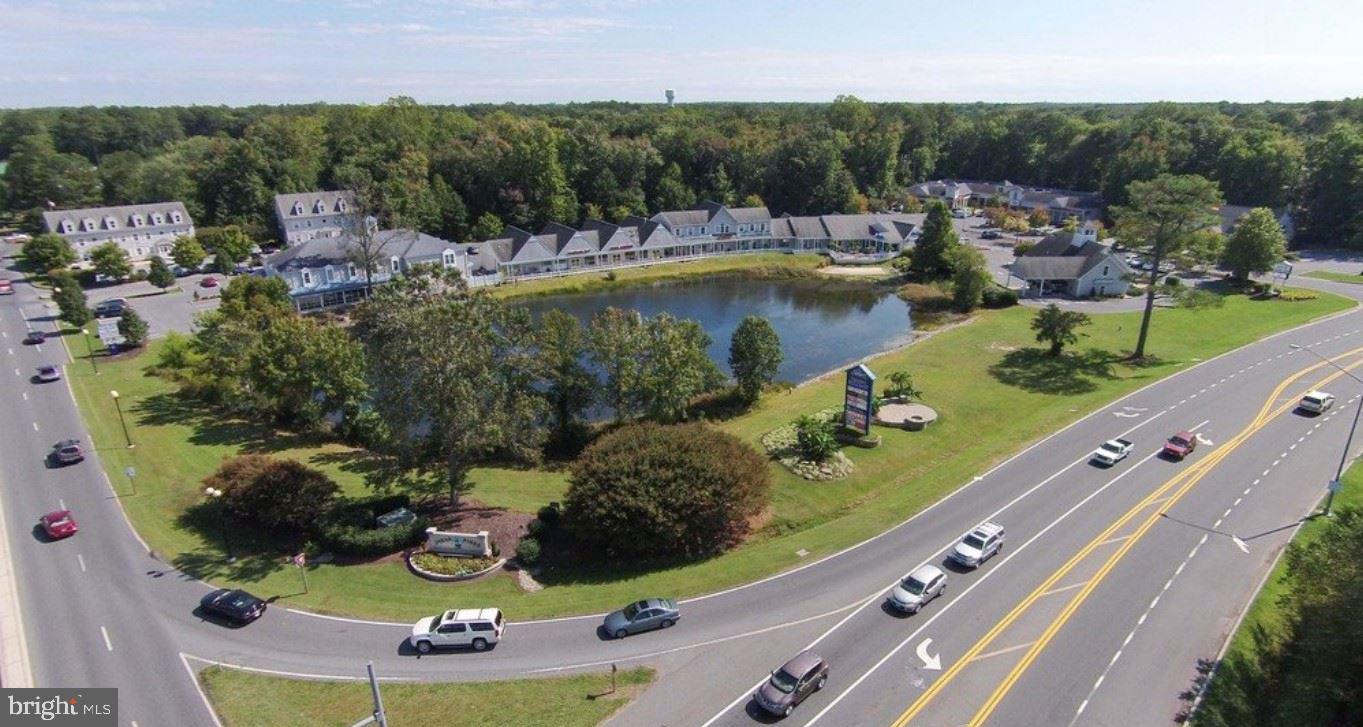 1,190 SF Condo Unit for sale in Village Square. Currently a jewelry store but will be delivered vacant at settlement (tenant to vacant Sept. 1, 2018). Well kept commercial condo project located at the South Gate entrance at Ocean Pines. Two adjacent units (#8, 1,137 SF & #9, 2,571 SF) also available for sale.