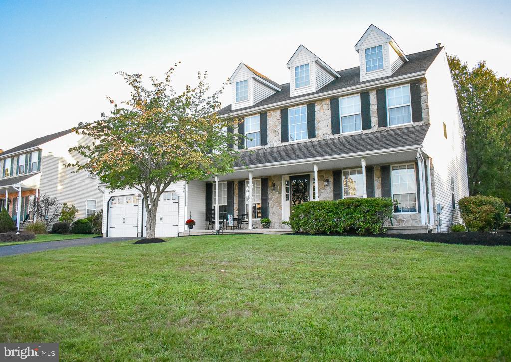 Step inside and fall in love with this stunning center hall colonial in the highly desirable Meadow Glen community. With nearly 3,200 sq ft of living space, this 4-bedroom, 2.5-bath home impresses with its thoughtful layout, dual staircases, and abundant natural light. The first floor offers a classic, functional layout ideal for everyday living and entertaining. You'll find a formal living room and dining room, a home office perfect for remote work, a gourmet kitchen with modern conveniences, a cozy family room featuring vaulted ceilings, a fireplace, and a second staircase; and a powder room and laundry room for added convenience.
Upstairs, retreat to the spacious primary suite complete with an en suite bath. Three additional bedrooms, all with generous closet space, and a second full bath offer comfort and privacy for family and guests.
The full, unfinished basement provides endless possibilities — create a home gym, playroom, or media room while still leaving plenty of storage space. Outside, start your day on the covered front porch with your morning coffee, or unwind in the fenced-in backyard under the large shade tree. Dine al fresco on the rear patio beneath the retractable awning — a perfect spot for entertaining or relaxing with loved ones. Additional highlights include a two-car garage, roof (2013), hot water heater ( 3 years old), a flat, private backyard — ideal for children and pets, and a prime location in the heart of Bucks County, close to shopping, dining, parks, and schools — many amenities are even within walking distance! Don’t miss your chance to make this beautiful property with so much potential your forever home!