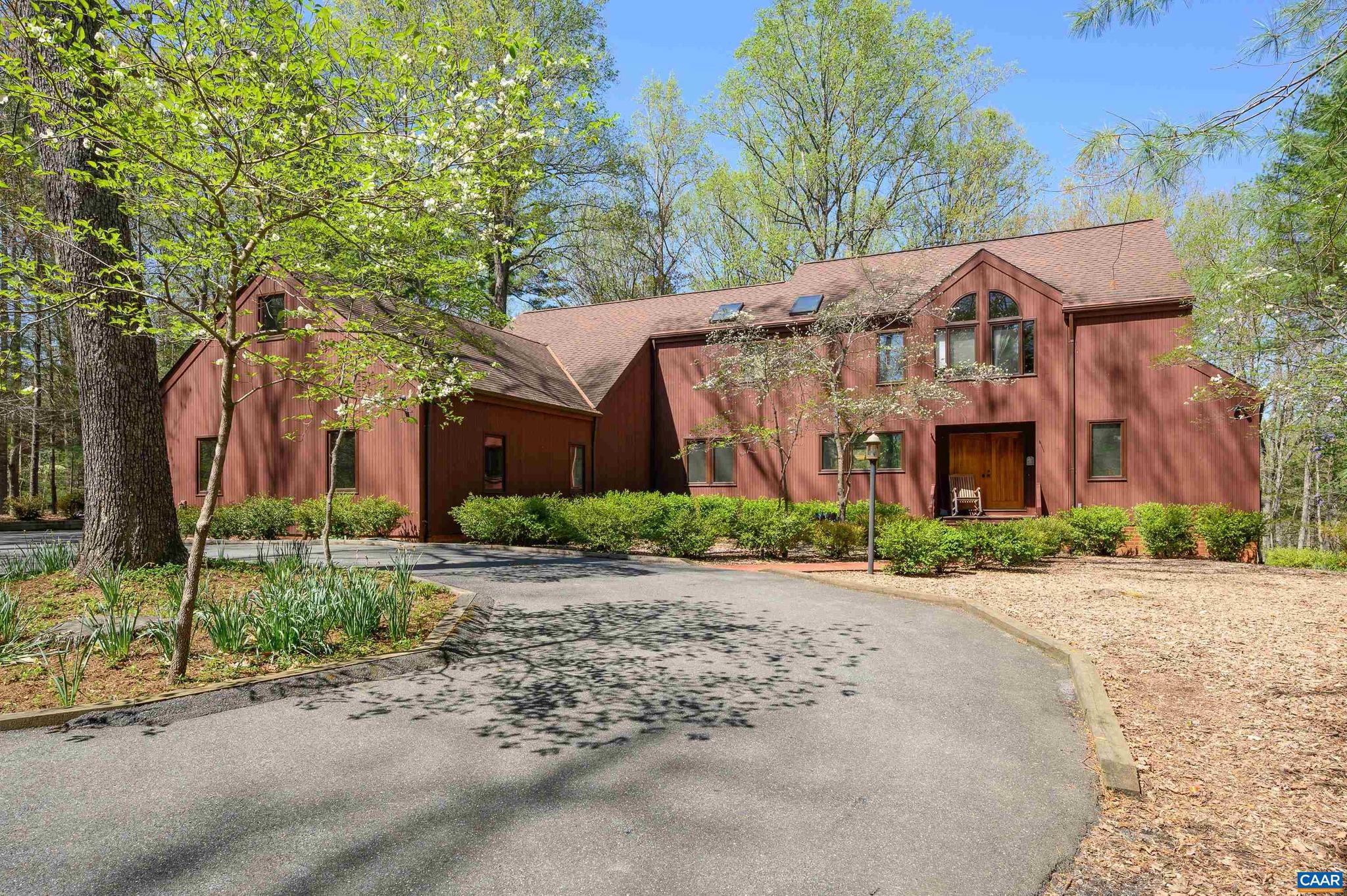 Beautiful contemporary Acorn style residence in impeccable condition. Custom build using excellent, quality materials throughout, this lovely sunny residence is an astonishing value . Located in the sought after Waverly subdivision, convenient to both Charlottesville and Crozet and in the Ivy Elem, and Henley ,Western Albemarle HS school districts. Offering 5 bedrooms and 6 full baths, including a first and second floor primary bedrooms. The first floor primary bedroom and bath are handicapped accessible and can be an excellent quest suite or bedroom. This is a spacious , light filled house on 3.14 acres. Features too numerous to count: oversized 2 car garage , all oak flooring, security system .rec room in lower level. Granite counters , Kitchen island ,marble surround fireplace, HUGE entertainment deck, cedar siding , 40 year roof, whole house generator, updated appliances, Jaeger and Ernst cabinetry and build ins.,Oak Cabinets,Quartz Counter,Wood Cabinets,Fireplace in Great Room