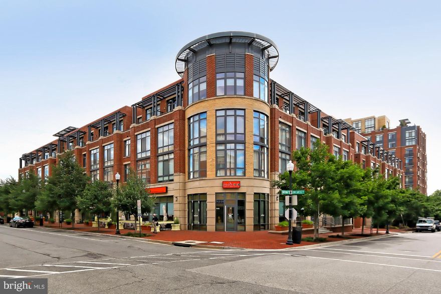 Developed by PN HOffman, Stunning 1 LARGE br is modern & open. Enjoy neutral decor, wood floors, granite bath & kitchen, SS apps, W/D, garage space, high ceilings and more. Southern exposure fills the home w/light. Above great retail & blocks to King St metro, shops, restaurants, AMC movies, Whole Foods & PTO. Enjoy courtyard, security & staffed desk. Pool & gym available for a low monthly fee.