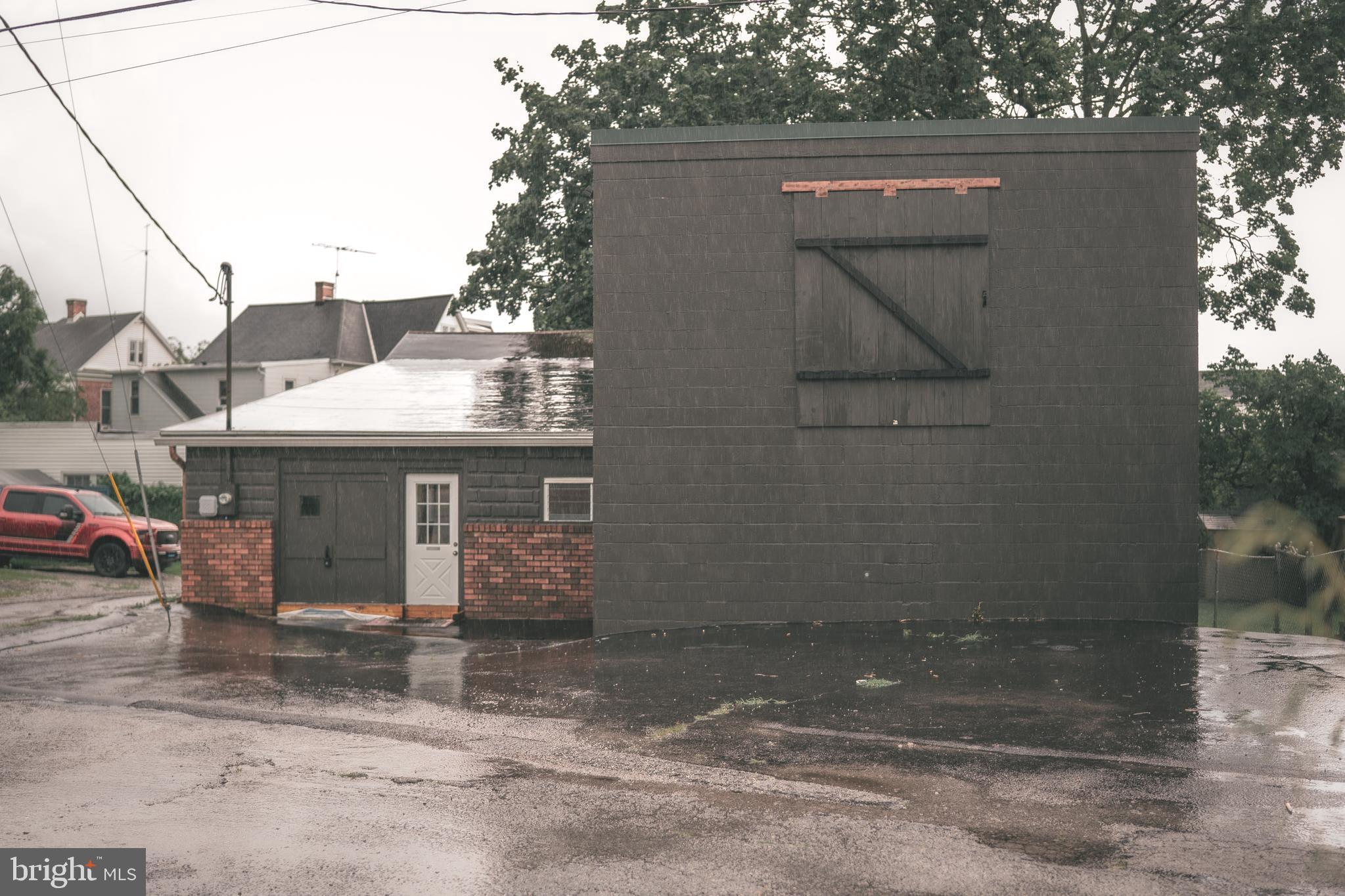 Great space with many possibilities for your business! Check with township for your specific needs. Building is in great shape with heat and air conditioning. Currently a photography studio on 2nd floor and wrestling gym on main floor. Half bath on each floor. Five parking spaces on property.