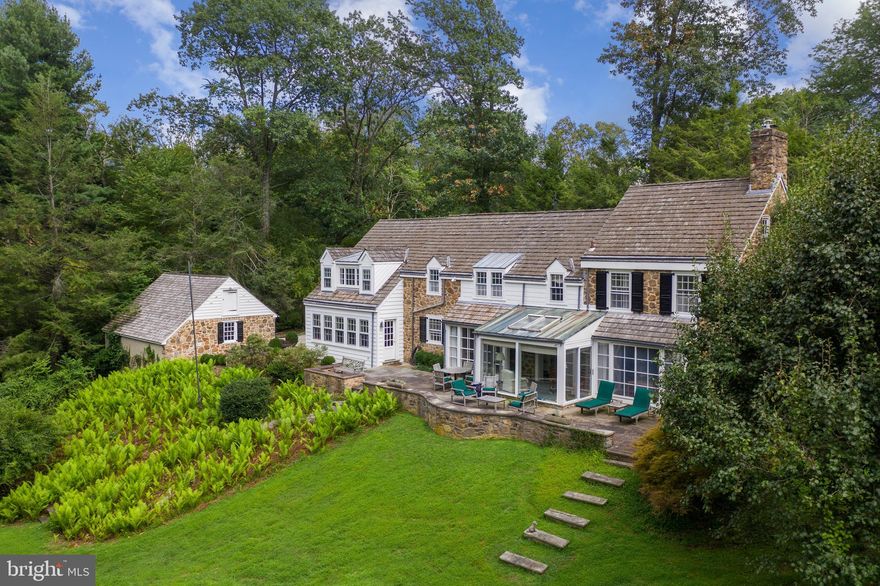 Your house hunting days are over! Welcome to charming  8535 Ardmore Avenue that awaits you with stunning views.   Located in Wyndmoor and walking distance of Chestnut Hill, this Pennsylvania field stone house is not only move-in ready but also one of only two Richardson Okie-style houses in the Philadelphia area.  Okie and his students created beautiful houses known for their history, craftsmanship and traditional building. 8535 Ardmore Avenue embodies all of these traits while also being fully updated! And, this house has been so loved that only two owners have lived in it since 1940. 

When the current owners bought the house in 1997, they hired famed architect Peter Zimmerman to create additional living space that encompassed a new kitchen and pantry/bar area - all with Jim Arthur cabinetry, a two-story family room with fireplace, an extra bedroom and bath, front door entrance room and a large flagstone patio. The final result maintained the architectural style and provided over 4,000+square foot living and entertaining spaces, with great circulation.  Landscaper, Eliot Templeton added his touch to the outside of the house and over the years, plants and trees have been added to create a sublime, private, arboretum-like setting.

See for yourself why this beautifully sited home is ideal for today’s lifestyle. Additional features include 4 bedrooms, 3 and ½ bathrooms, dining room, sun room and living room – all with stunning valley views, a large unfinished basement, an exercise room and a two car garage with overhead storage.

This wonderful house is private, kid friendly and close to everything - Captain Andy's and Enzos on Willow Grove and a 12-minute walk to Germantown Avenue and the SEPTA train lines.  8535 Ardmore Avenue is a rare combination of a classic Philadelphia home with all the modern amenities you could wish for, in a coveted location. Your house hunting days are indeed over.