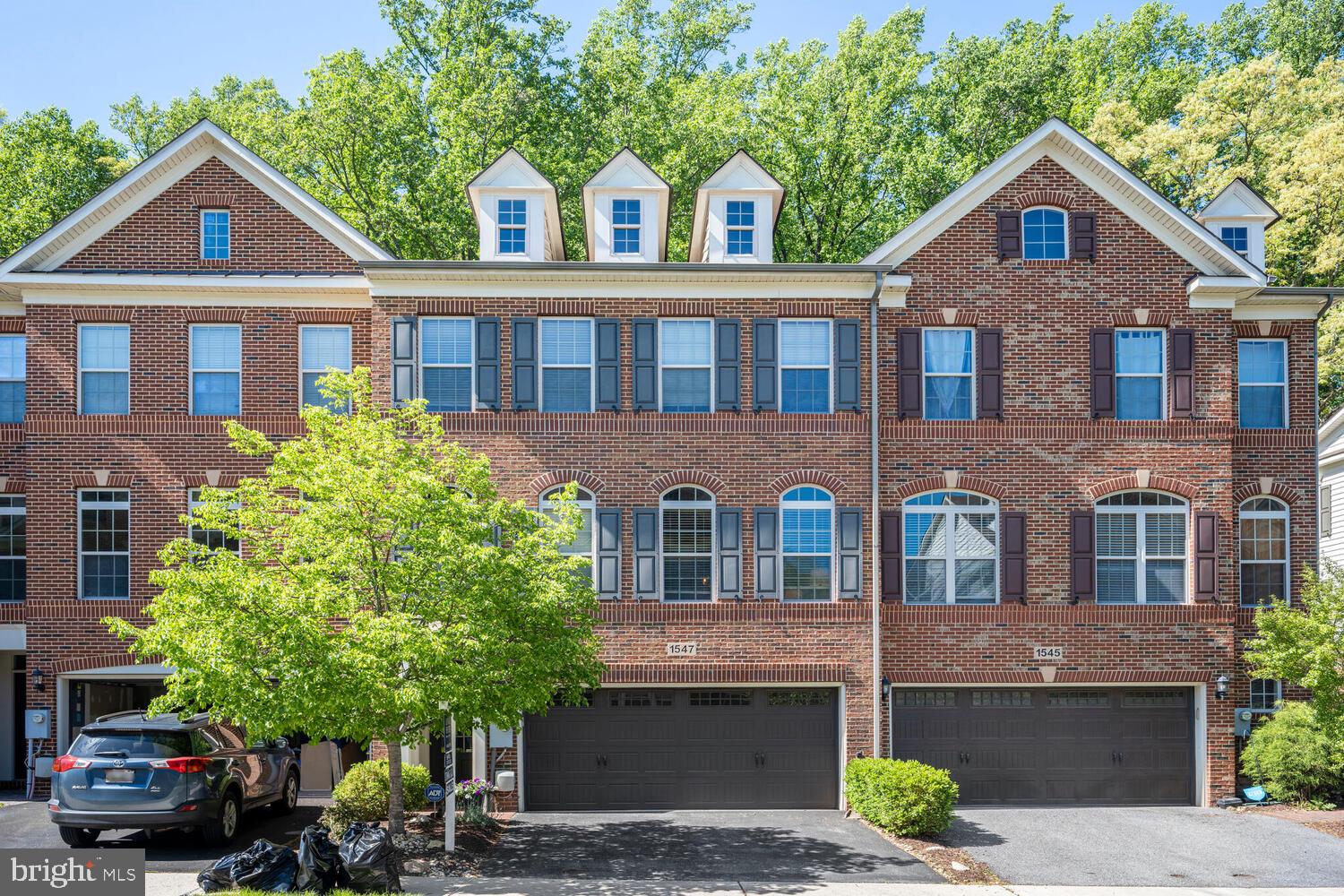 ****DRASTIC PRICE REDUCTION****
Modern Elegance, Premium Upgrades & Exceptional Community Amenities!
Welcome to this stunning 3-bedroom, 3.5-bath contemporary townhouse, built in 2012, offering an abundance of thoughtfully designed living space packed with high-end upgrades. The gourmet kitchen features upgraded countertops, custom cabinetry, a large island, upgraded lighting, and energy-efficient stainless steel appliances. Flowing hardwood floors, crown molding, and chair railings add timeless style throughout.
The luxurious primary suite offers a custom walk-in closet and a spa-inspired bathroom with decorative tile, a soaking tub, and a walk-in shower. Enjoy movie nights or game days with a built-in Sonance surround sound system, and relax in the first-floor recreation room complete with heated floors. An exterior deck extends your living space outdoors—perfect for entertaining.
Additional highlights include a 75-gallon water heater, ADT alarm system, upgraded lighting in the dining area, energy-efficient windows, a spacious 2-car garage with extra driveway parking, and a dedicated laundry area conveniently located on the third floor, bedroom level.
Enjoy the vibrant community with access to walking paths, a community center, playground, and a sparkling pool. This home combines luxury, comfort, and convenience—don’t miss your chance to make it yours. Schedule your private showing today!