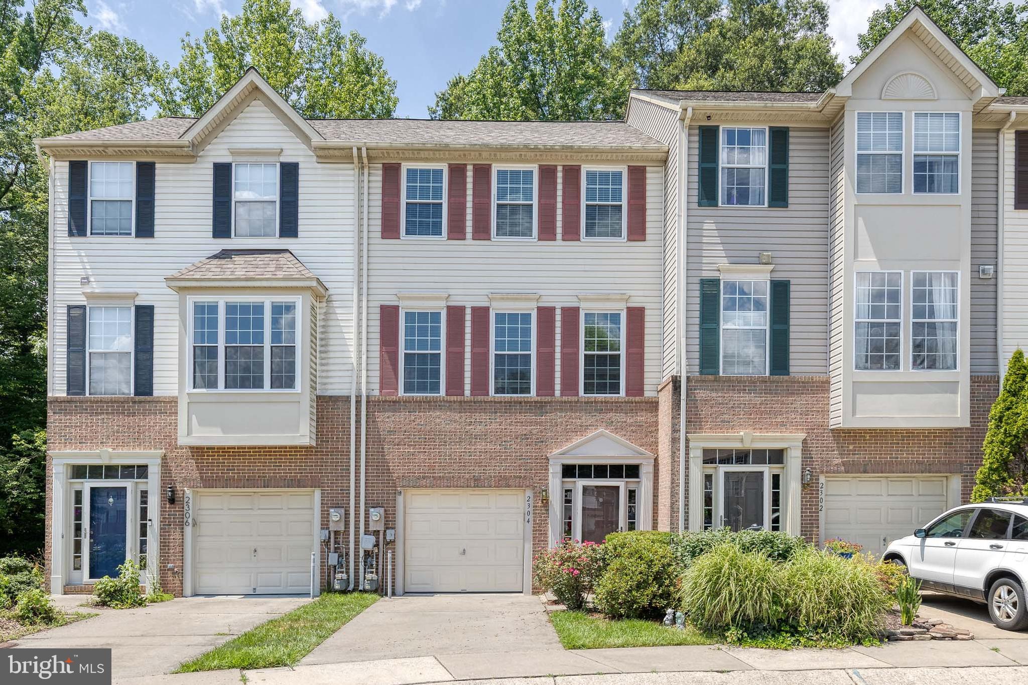 Nestled in the sought-after Piney Orchard community, welcome to Sandy Walk Way—a beautifully maintained and thoughtfully updated townhome that blends comfort, style, and convenience.
This three-level home features a one-car garage and a welcoming entry-level family room with access to a private patio. Backing to a serene wooded preserve, you'll enjoy peaceful views and extra privacy year-round. Upstairs, the main level showcases a spacious, light-filled open floor plan with oversized windows, gleaming hardwood floors, and stylish light fixtures. The heart of the home is the stunning kitchen—complete with white shaker cabinets, granite countertops, stainless steel appliances, a center island, ample pantry storage, a charming bay window, and modern farmhouse-inspired shelving. Step out onto the deck to relax, entertain, or host your next summer BBQ while soaking in the natural surroundings.
On the upper level, you'll find two generously sized bedrooms with a shared hall bath, plus a luxurious primary suite featuring a spa-like ensuite bathroom and abundant closet space. Enjoy all the top-tier amenities Piney Orchard has to offer, including community pools, a fitness center, clubhouse, scenic trails, shops, and dining—all conveniently located near major commuter routes and Ft. Meade.