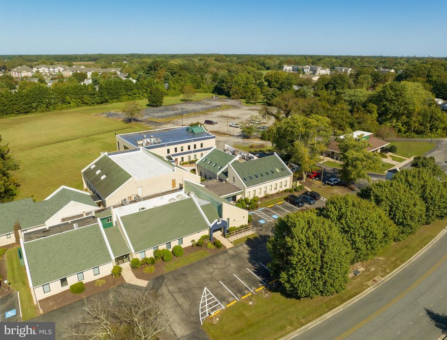 A 975 SF office space located in Philmore Commons. Unit features a private restroom and kitchenette. Lease type is triple-net (estimated @ $3.00 PSF) This unit could be combined with unit 104 for a total of 2,453 SF. This is an introductory rate for multiple year leases. Rate shall increase to ____ in year 2.