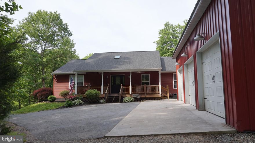 Fantastic Country Rancher situated on 3 acres just 2 miles form the VRE. This home offers a large front porch, two rear decks and beautiful blue stone patio. The interior comes with brand new hardwoods floors throughout entire house. You love the step down living room and formal dining room. The kitchen boasts lots of cabinets & counter space with lovely breakfast nook and pantry.  The master bedroom is large with walk in closet and big master bath. The garage is a mechanics dream. It is an oversized 3 car 24x36 with 12ft ceilings. The climate controlled Garage is equipped with fortified concrete pad to install car lift later  and a air compressor room, air compressor included.  The floor is high-strength concrete built in 2016. Plenty of storage and remote openers. There are 2 outbuildings dimensions 10x10 and 10x20 . In 2018 - new siding, roof, attic fan, skylights, gutters, and whole house water filtration system was added.