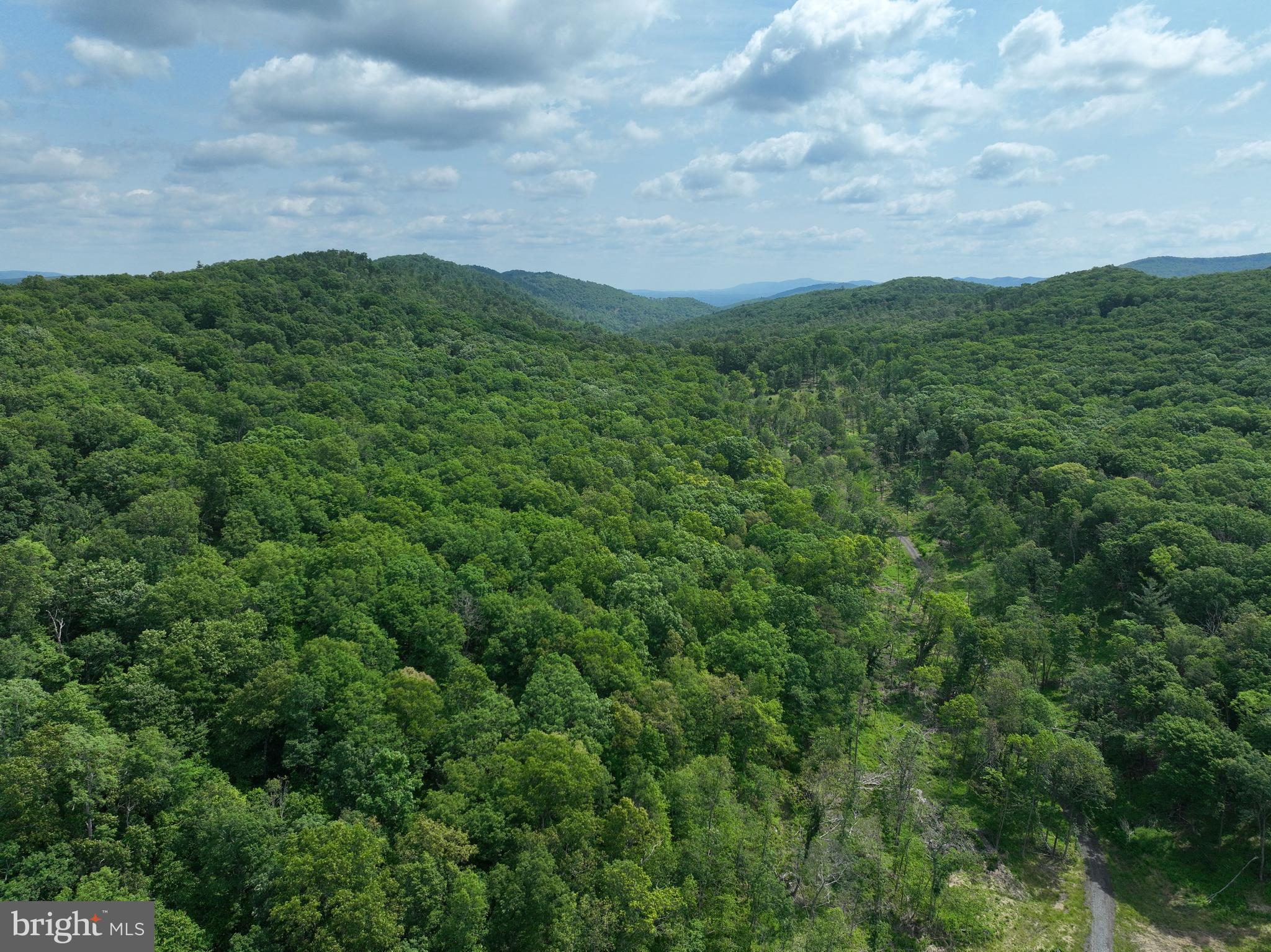 NONE UNRESTRICTED - Land