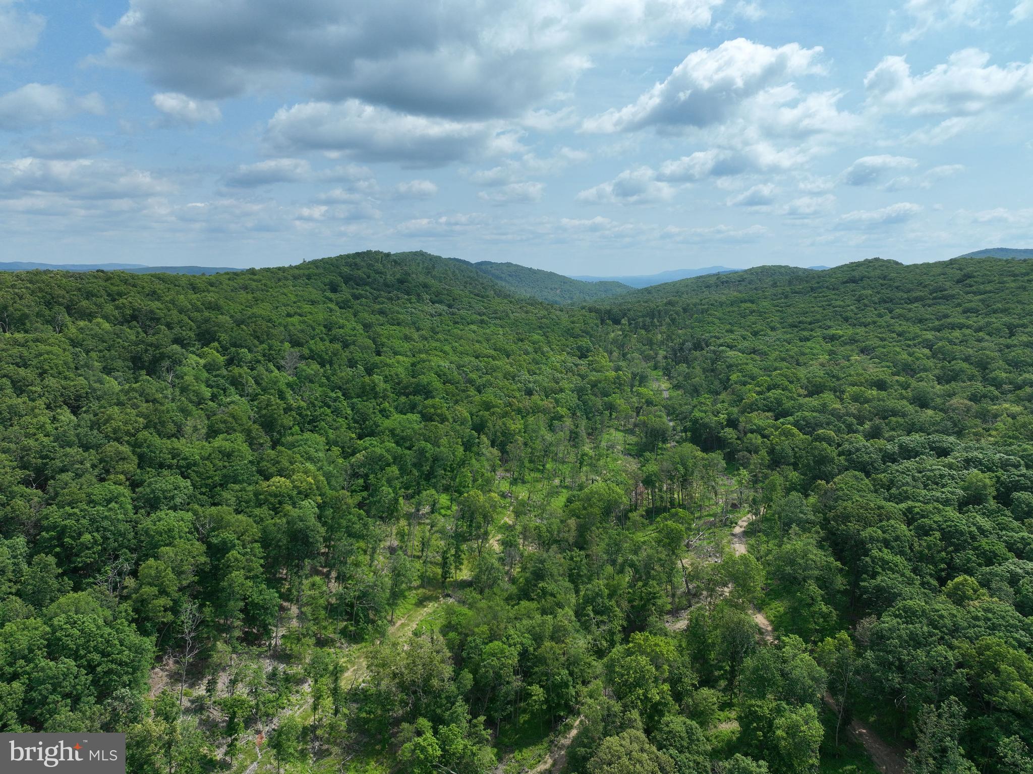 NONE UNRESTRICTED - Land